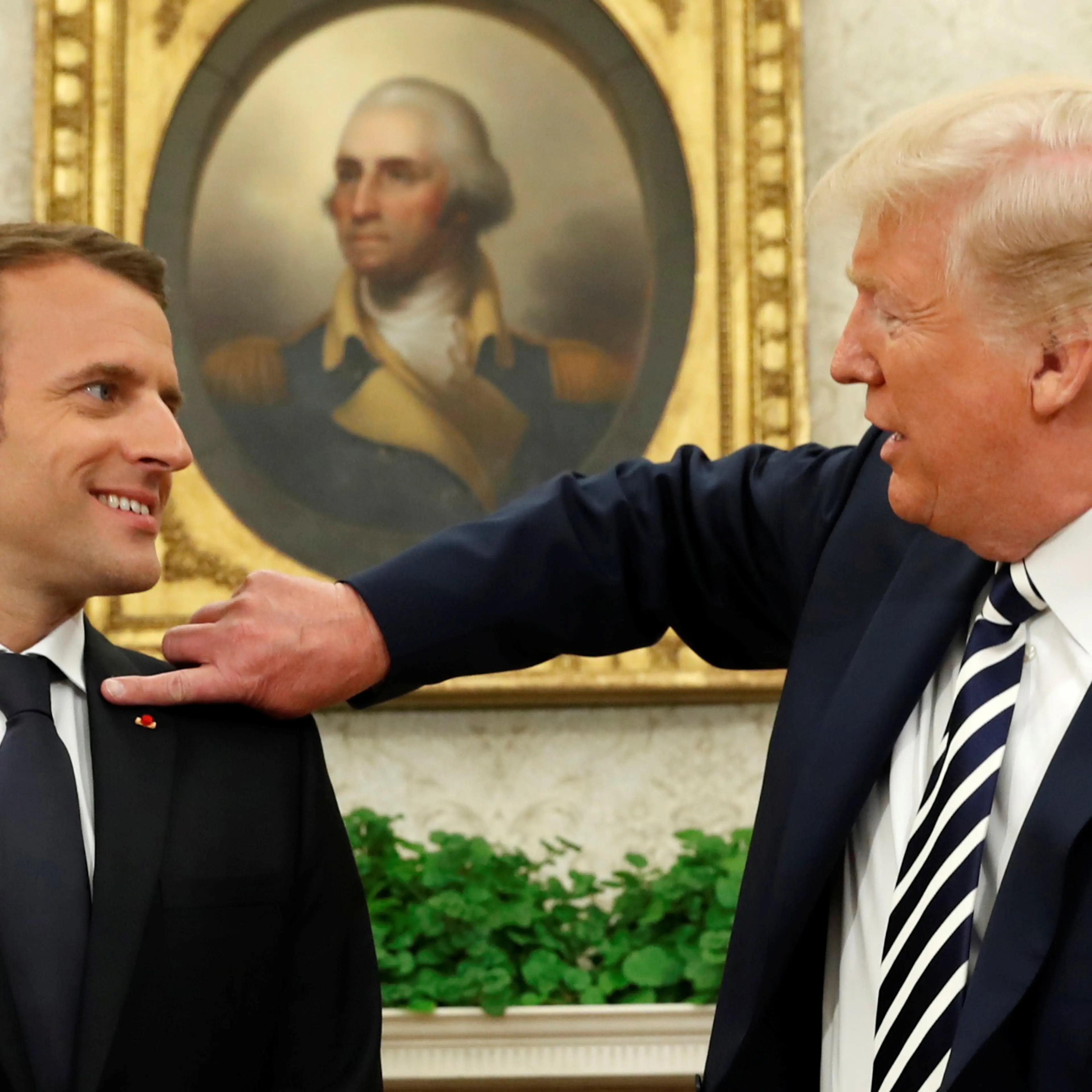 U.S. President Trump meets with French President Macron at the Oval Office at the White House in Washington