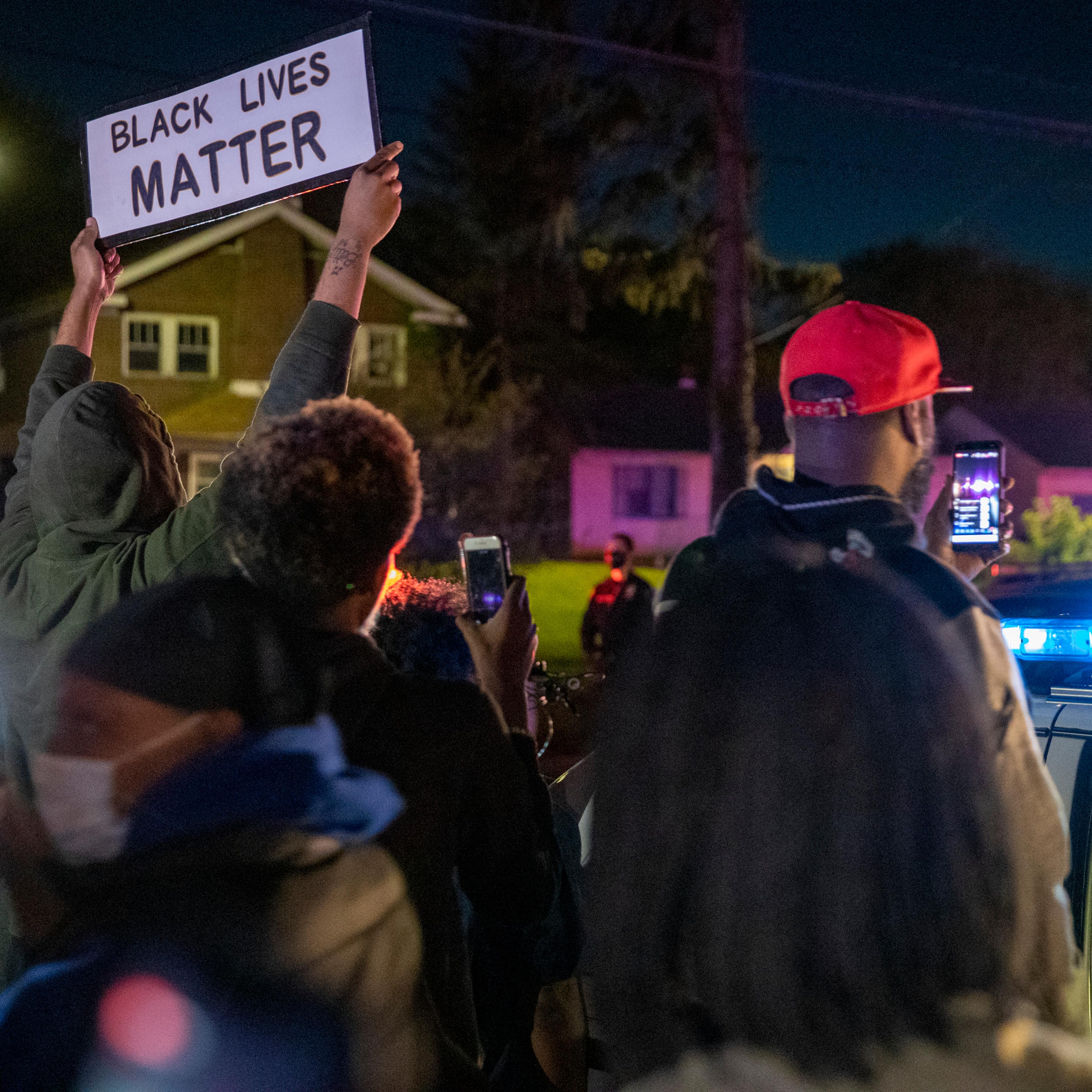 community members protest in Indianapolis, hours after a man was killed during an Indianapolis police involved shooting