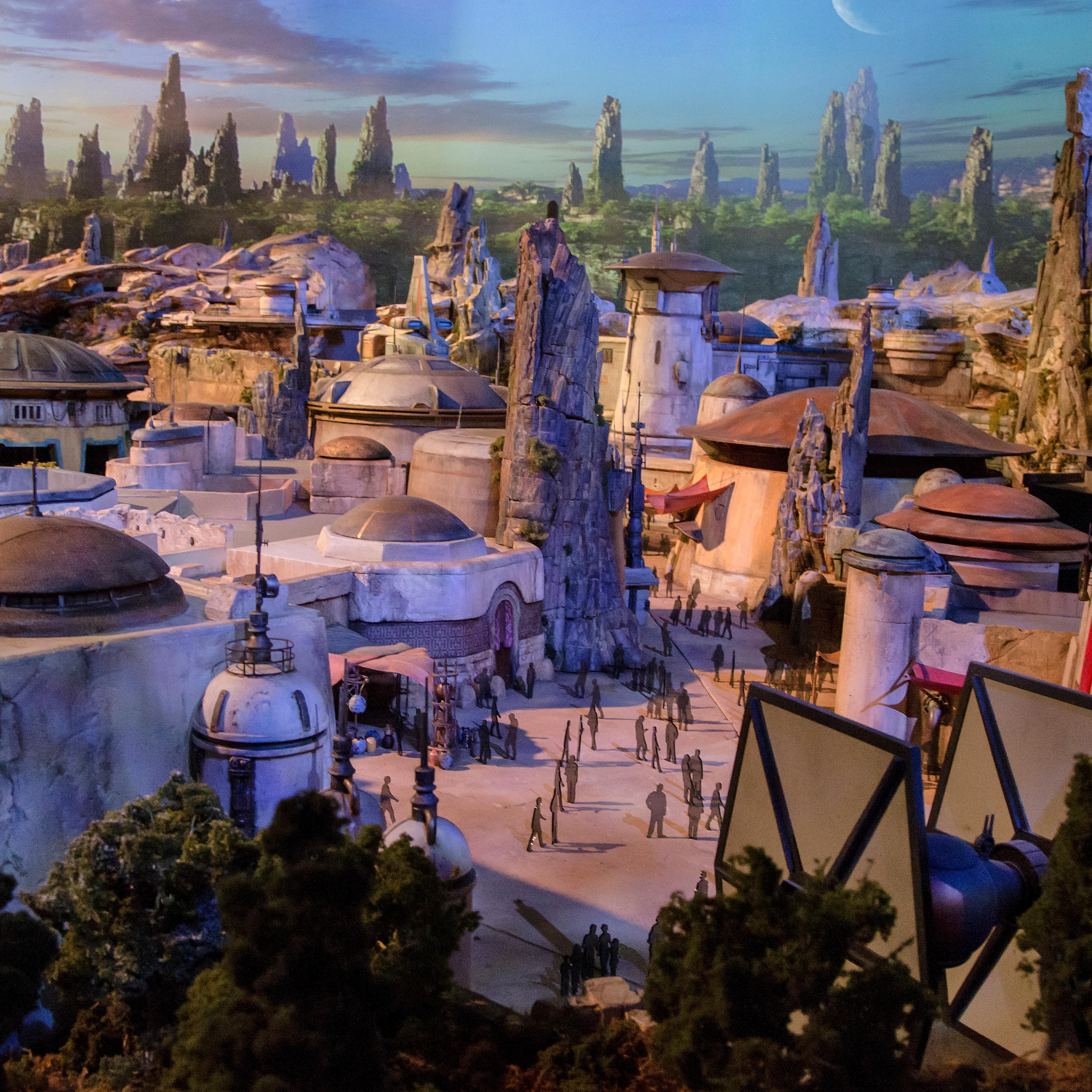 The fully detailed model of the Star Wars-themed park, under development at Disneyland in Anaheim, Calif., remains on display in Walt Disney Parks and Resorts 'A Galaxy of Stories' pavilion throughout D23 Expo at the Anaheim Convention Center. The exhibi