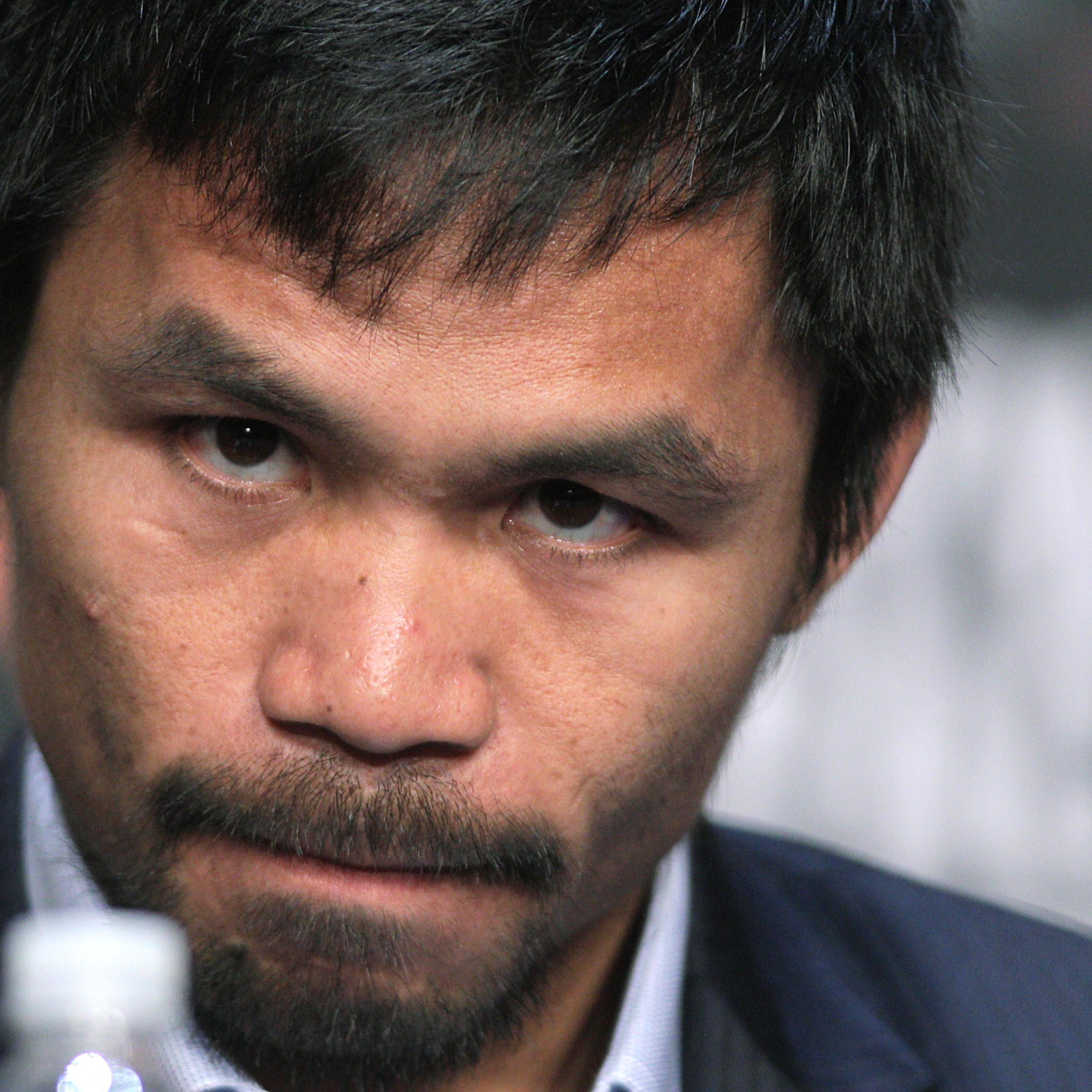WBO welterweight champion Manny Pacquiao listens during a news conference at the KA Theatre at MGM Grand Hotel & Casino in Las Vegas, April 29, 2015.