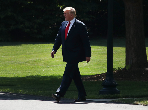 President Donald Trump walks to Marine One before departing from the White House on August 4, 2017 in Washington, DC.