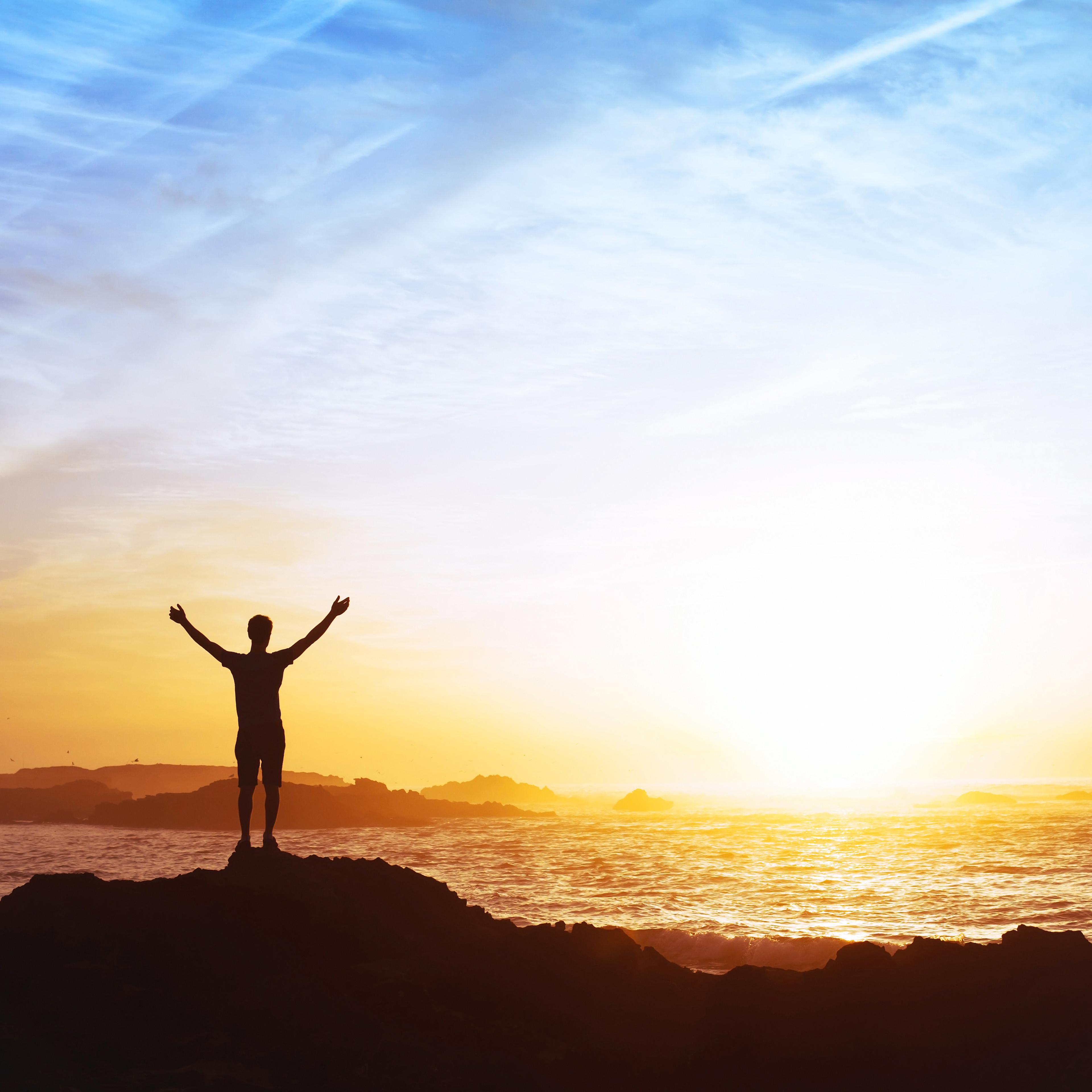 man-silhouette-standing-waters