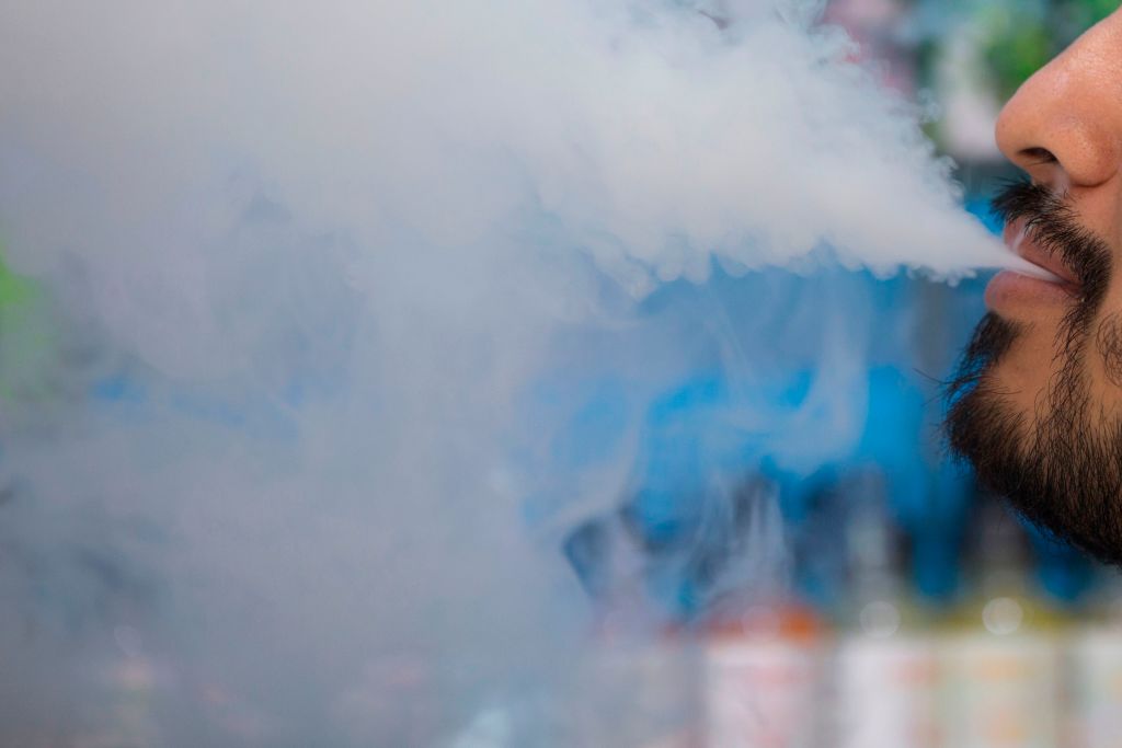 Vaping e-cigarettes