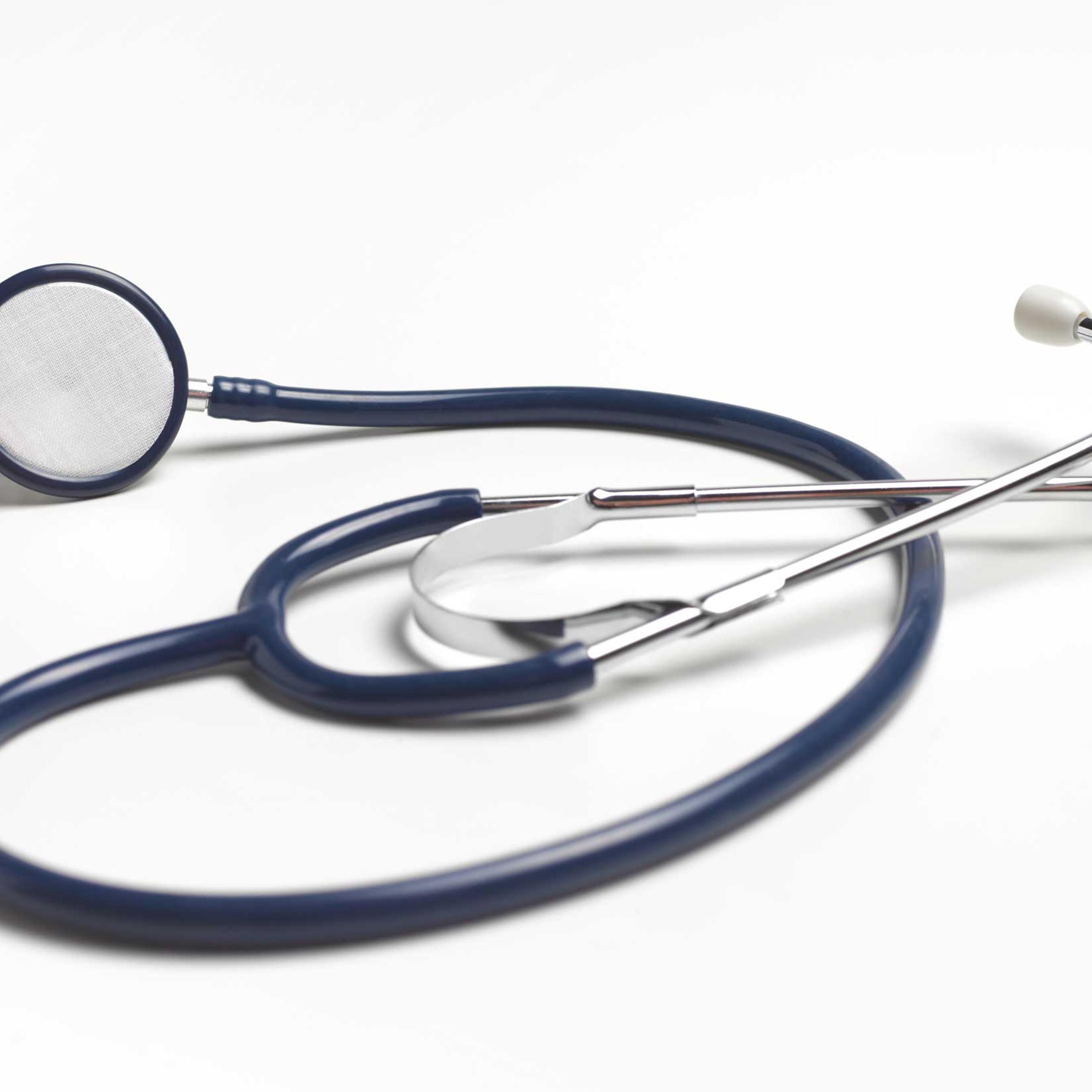 Blue stethoscope on white background