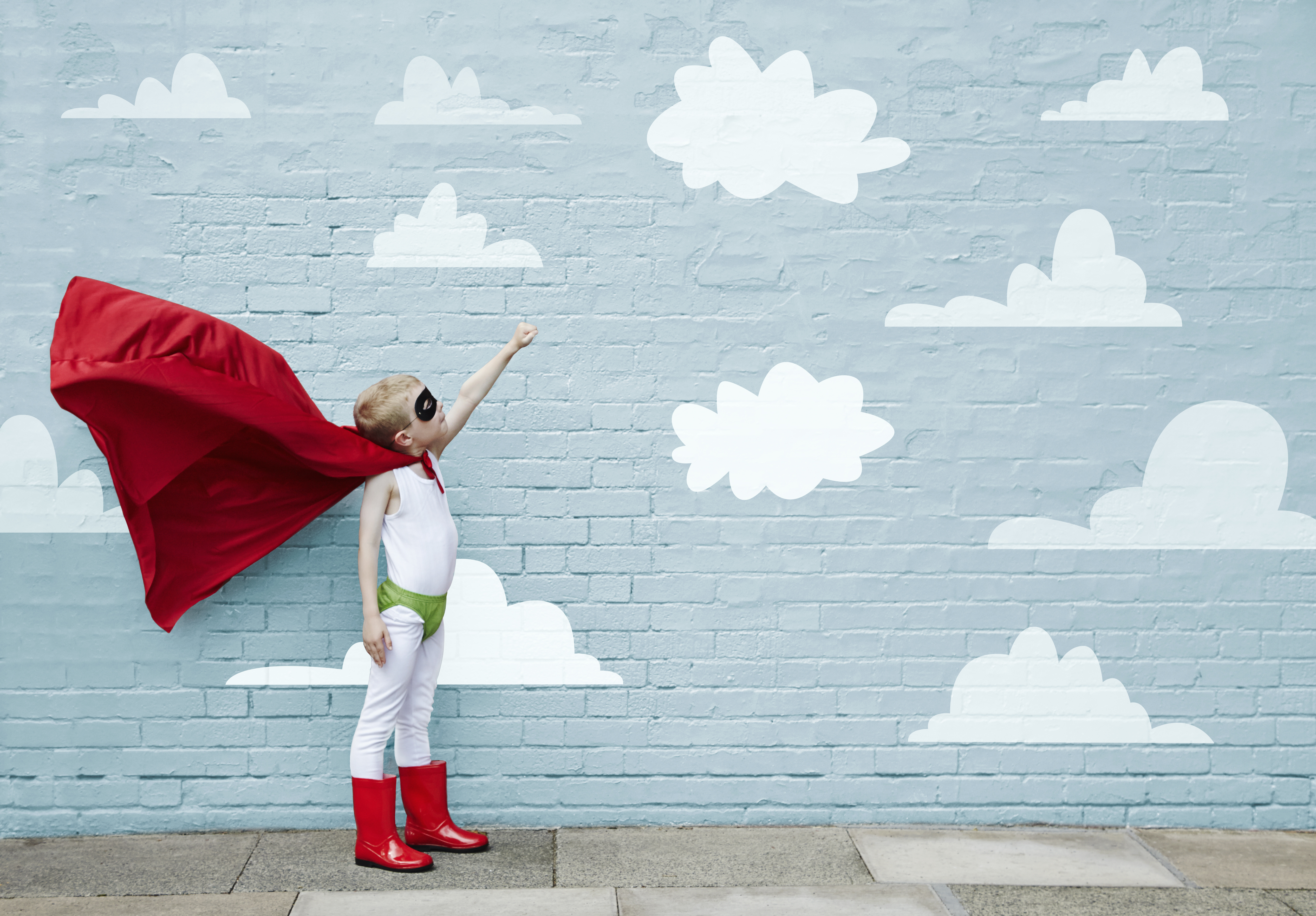 Boy dressed as a superhero