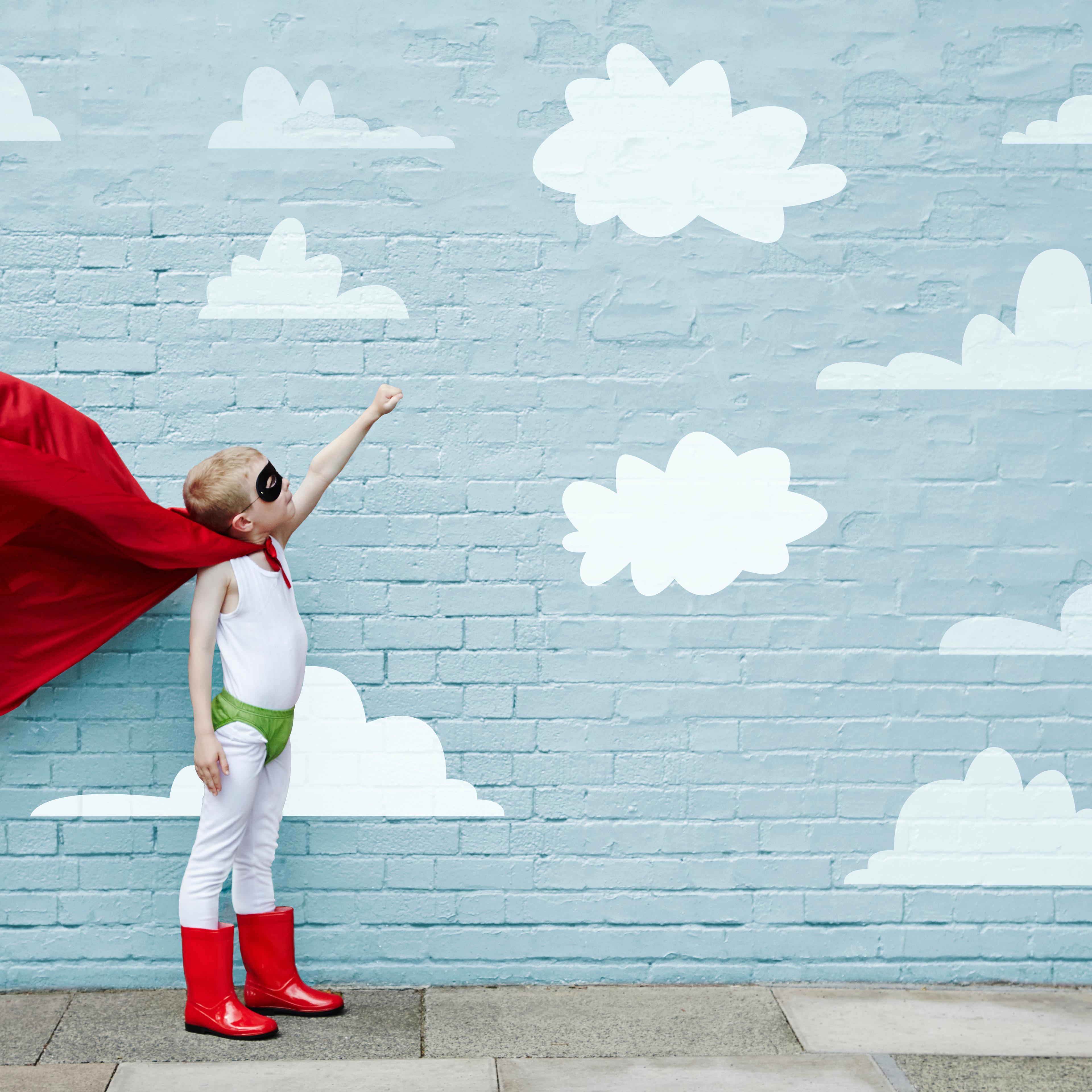 Boy dressed as a superhero