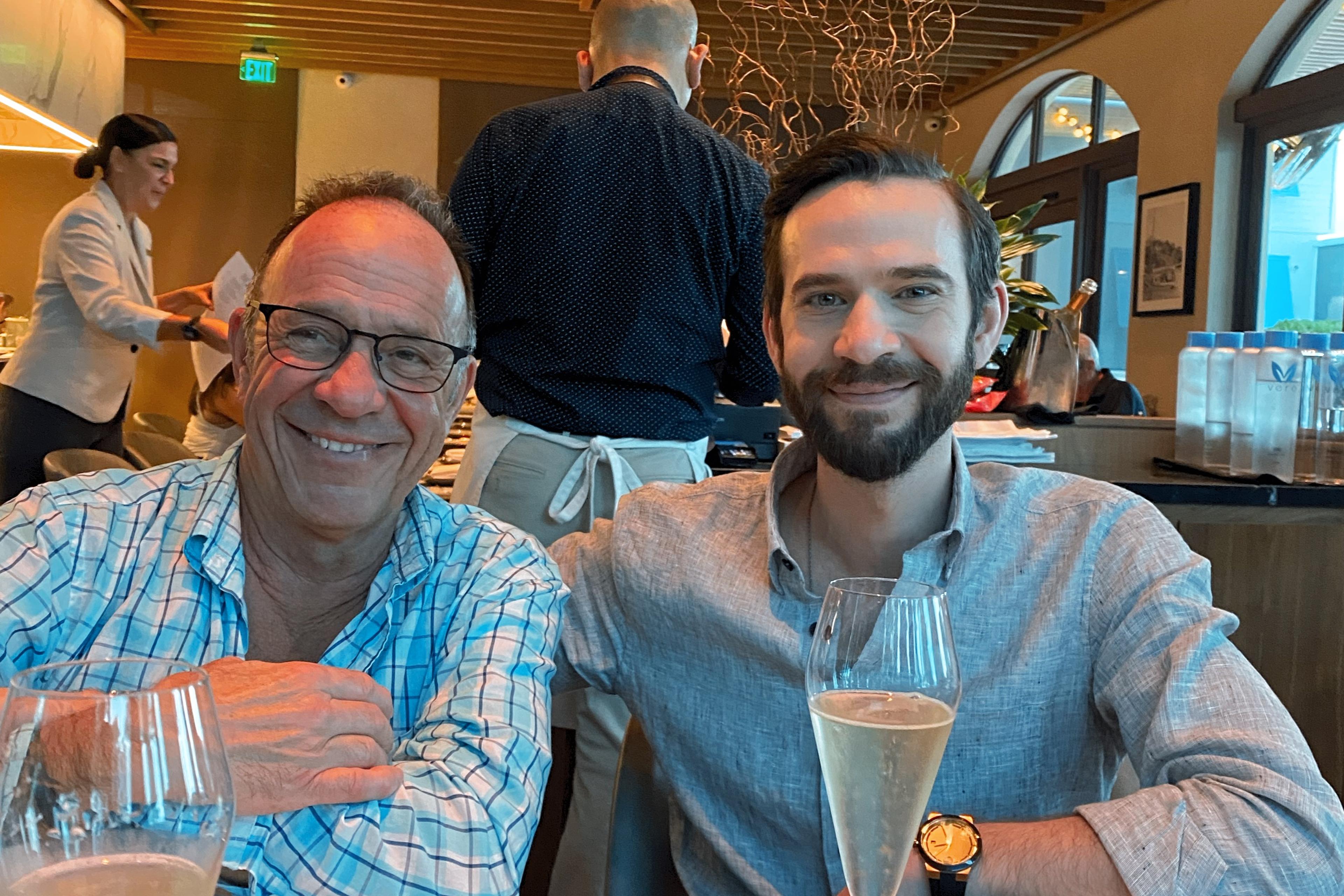 From left, Joel Galavas and his son Jonathan Galavas. Jonathan committed suicide in October 2025.