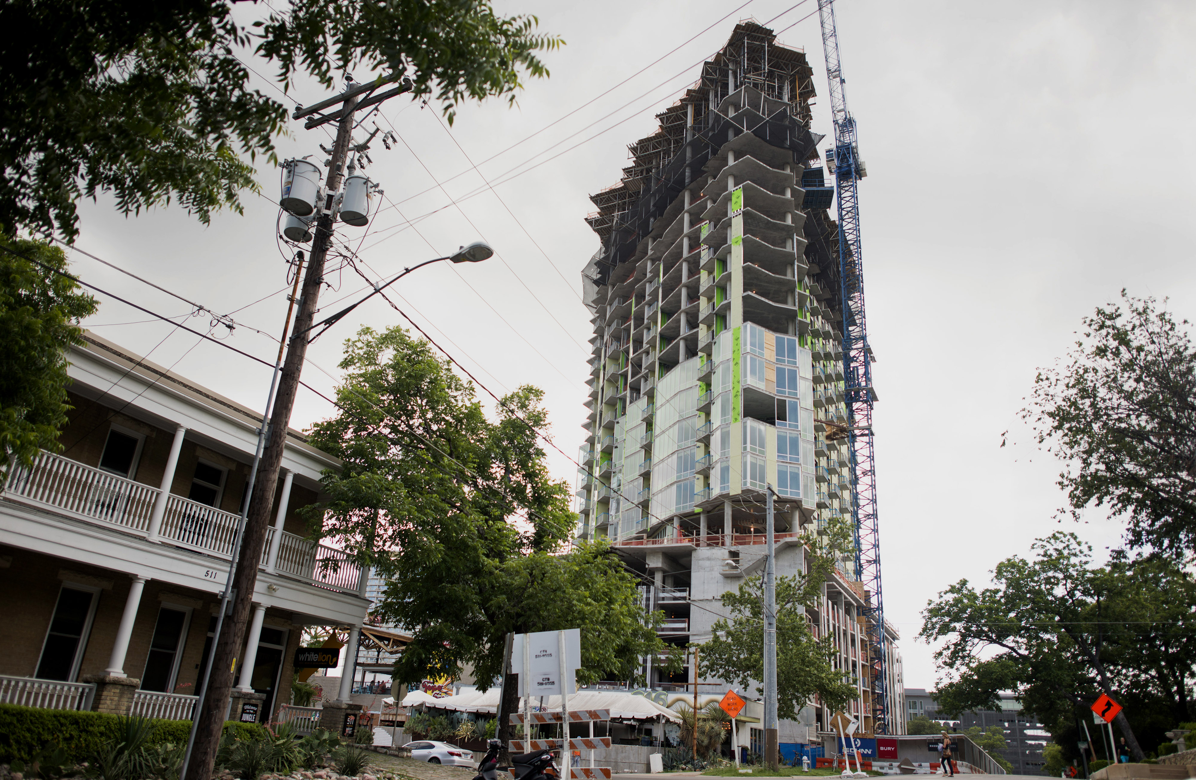 Views Of Austin And San Antonio As Cities Bear The State's Financial Burden