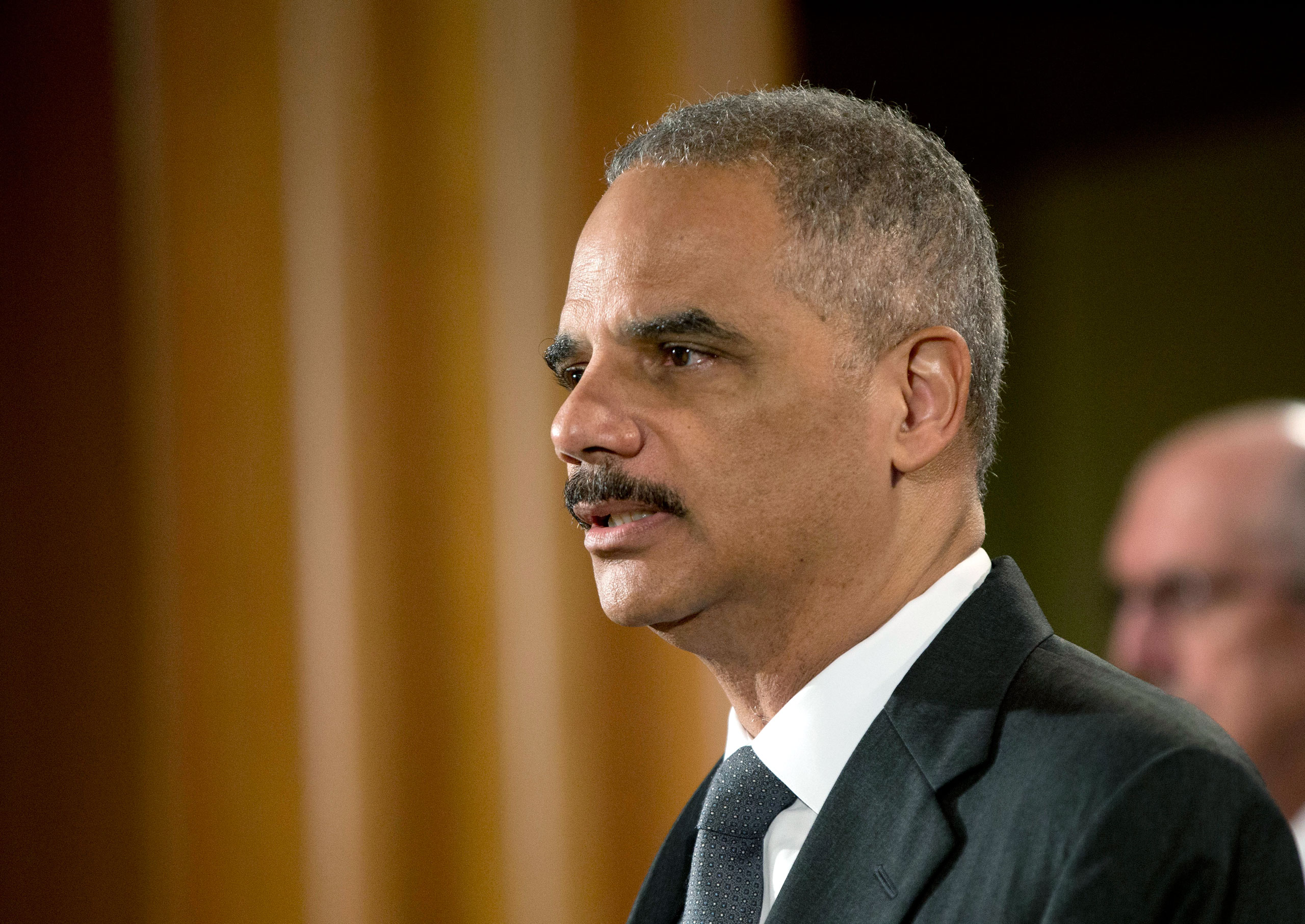 Attorney General Eric Holder announces at the Justice Department in Washington, D.C. on July 14, 2014, that Citigroup will pay $7 billion to settle an investigation into risky subprime mortgages, the type that helped fuel the financial crisis.