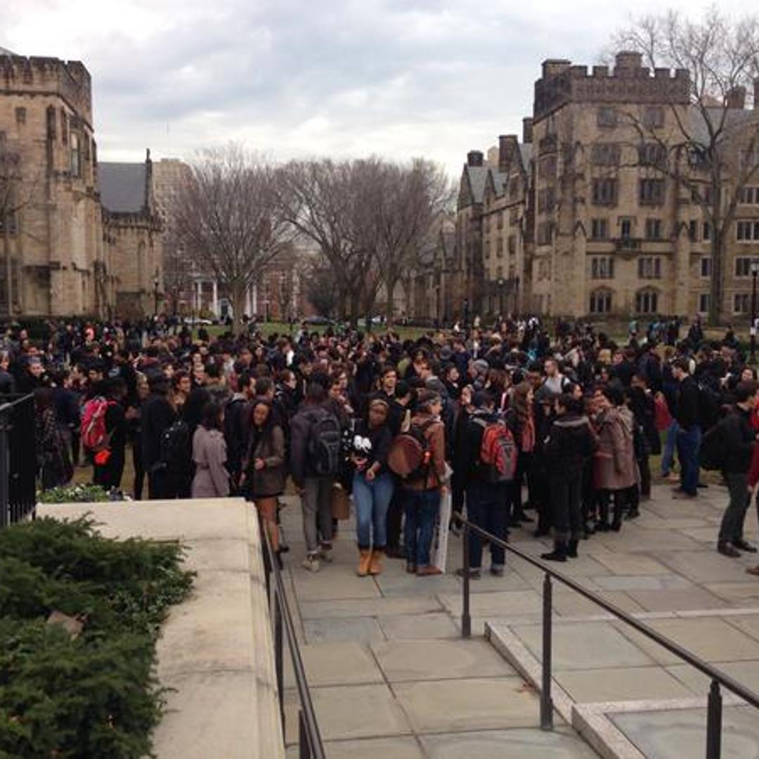 Heidi Knoblauch, a Yale historian, posted this picture saying, "I'm sure lots of other people took better pictures than this, but here is a glimpse of #HandsUpWalkout @Yale" http://t.co/76kUiy47Se