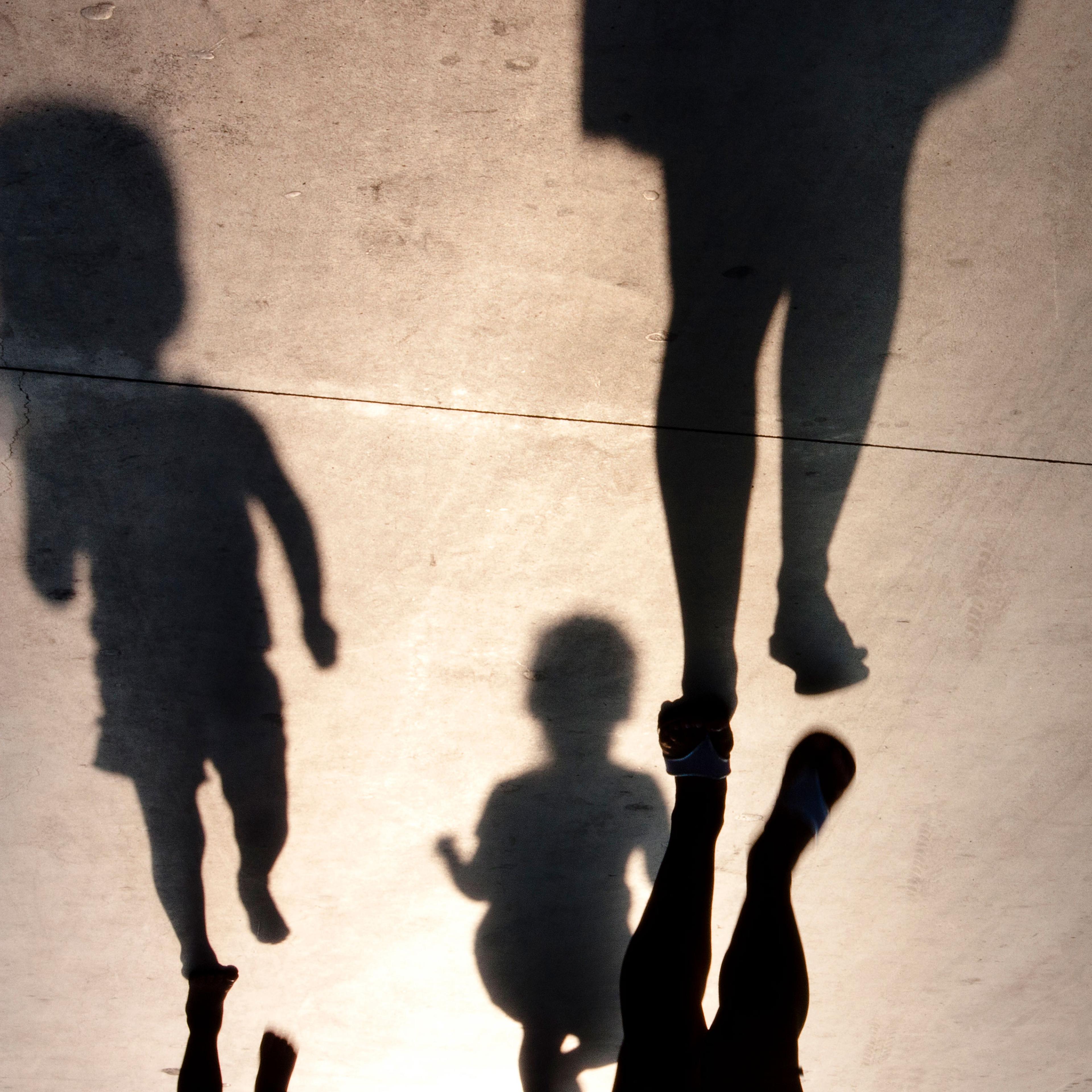 Shadows of a parent and children