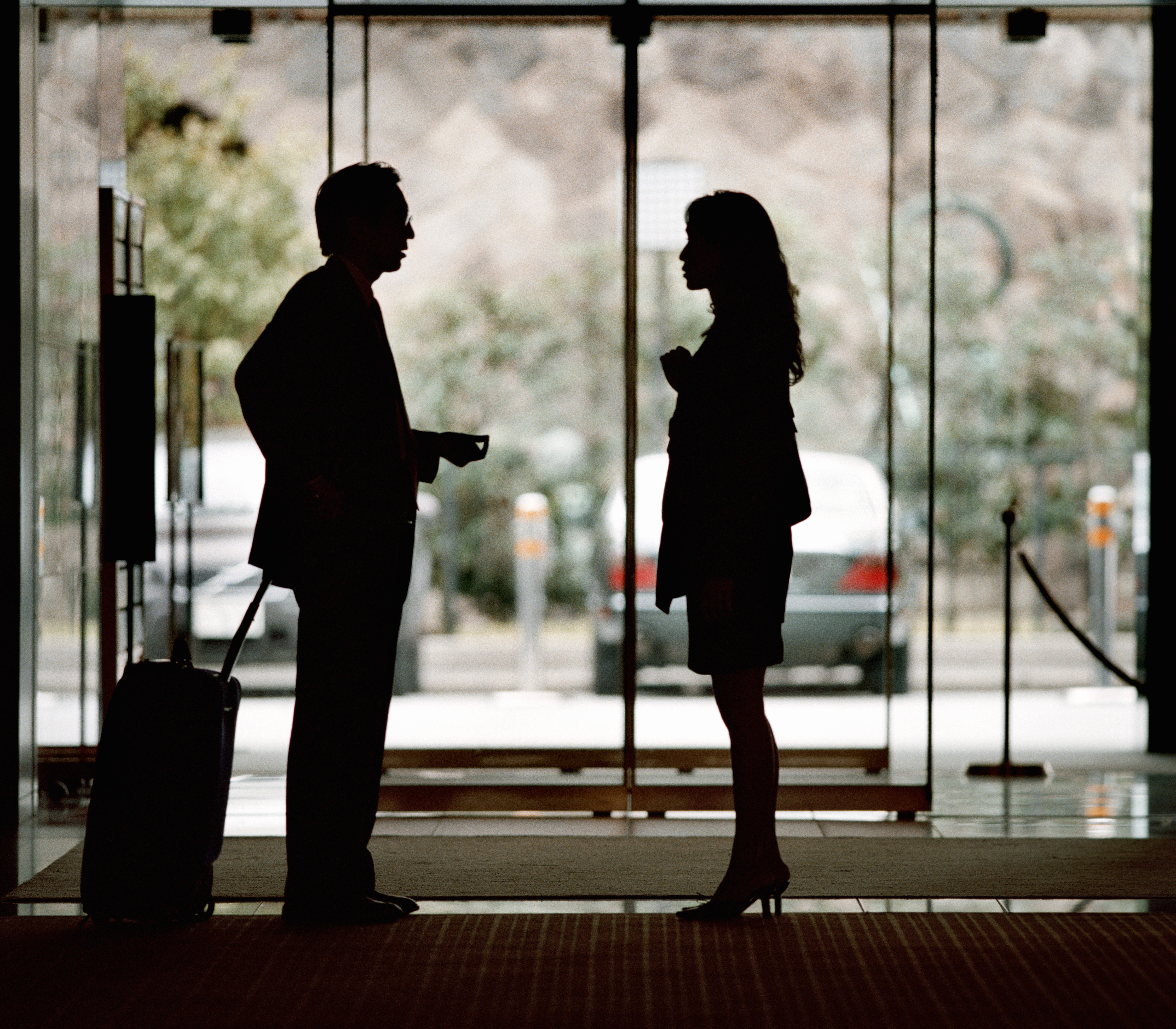 Man and woman in hotel lobby