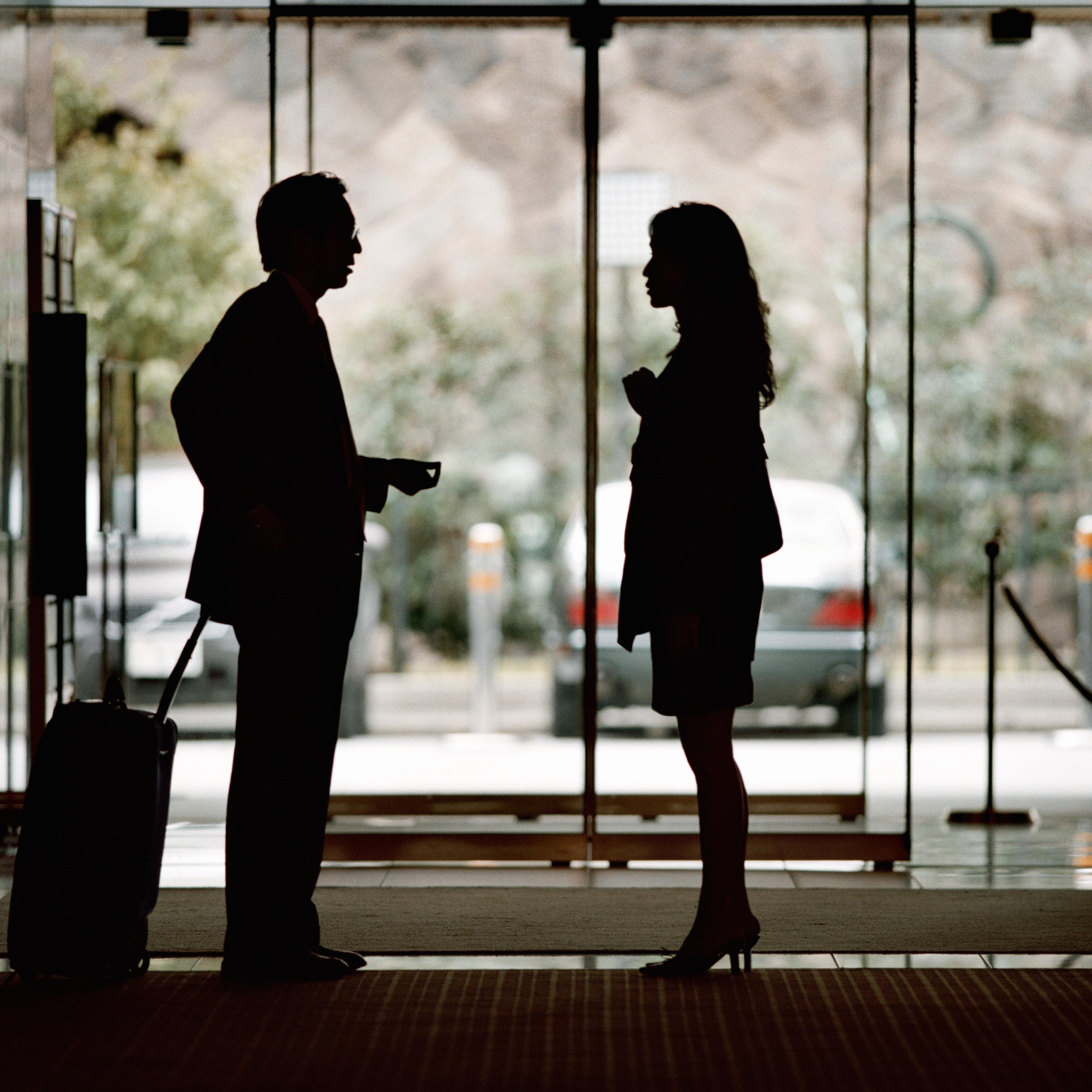 Man and woman in hotel lobby