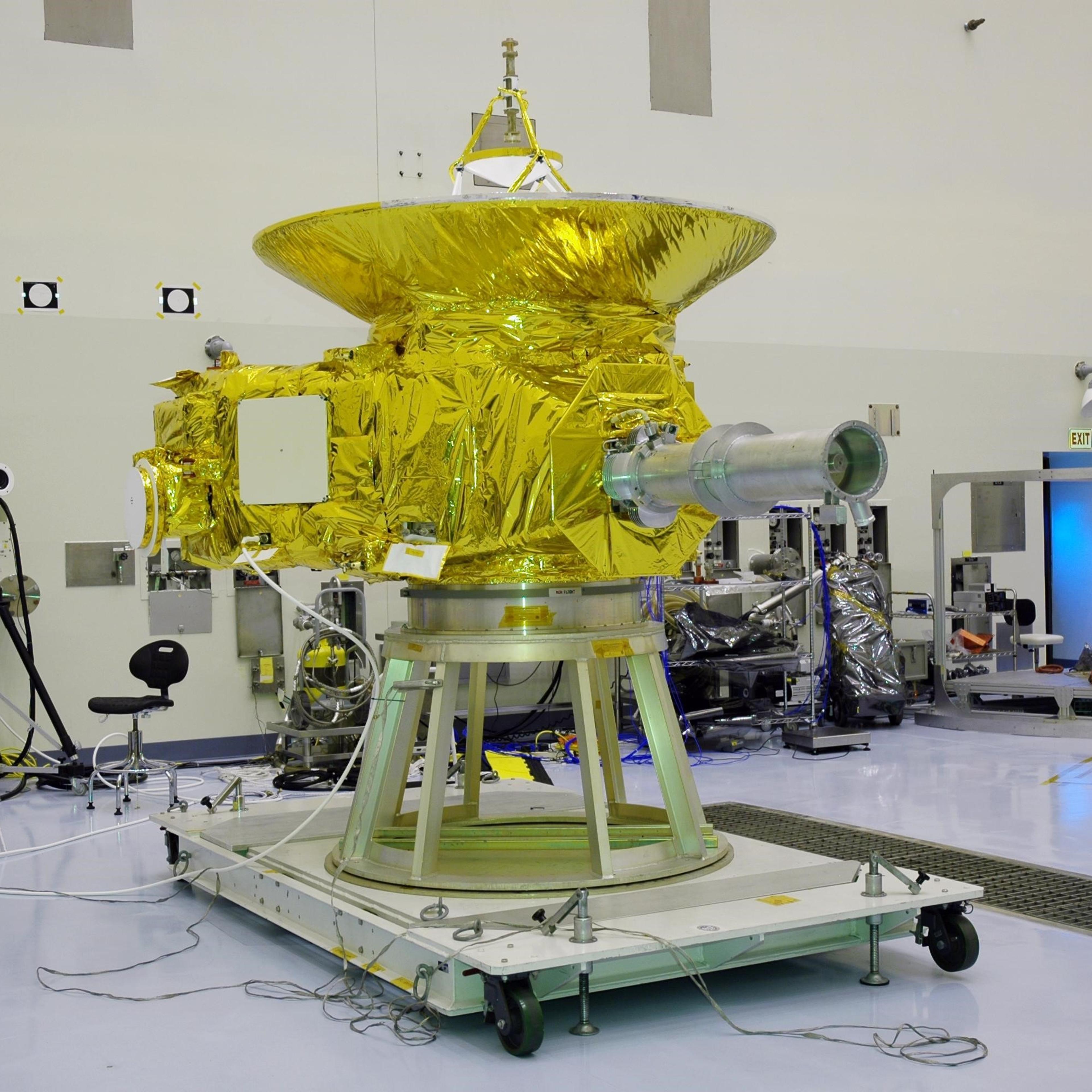KENNEDY SPACE CENTER, FLA. - In NASA Kennedy Space Center’s Payload Hazardous Servicing Facility, the New Horizons spacecraft sits on a work stand prior to being moved to a spin table. The spacecraft will undergo a spin test as part of prelaunch process