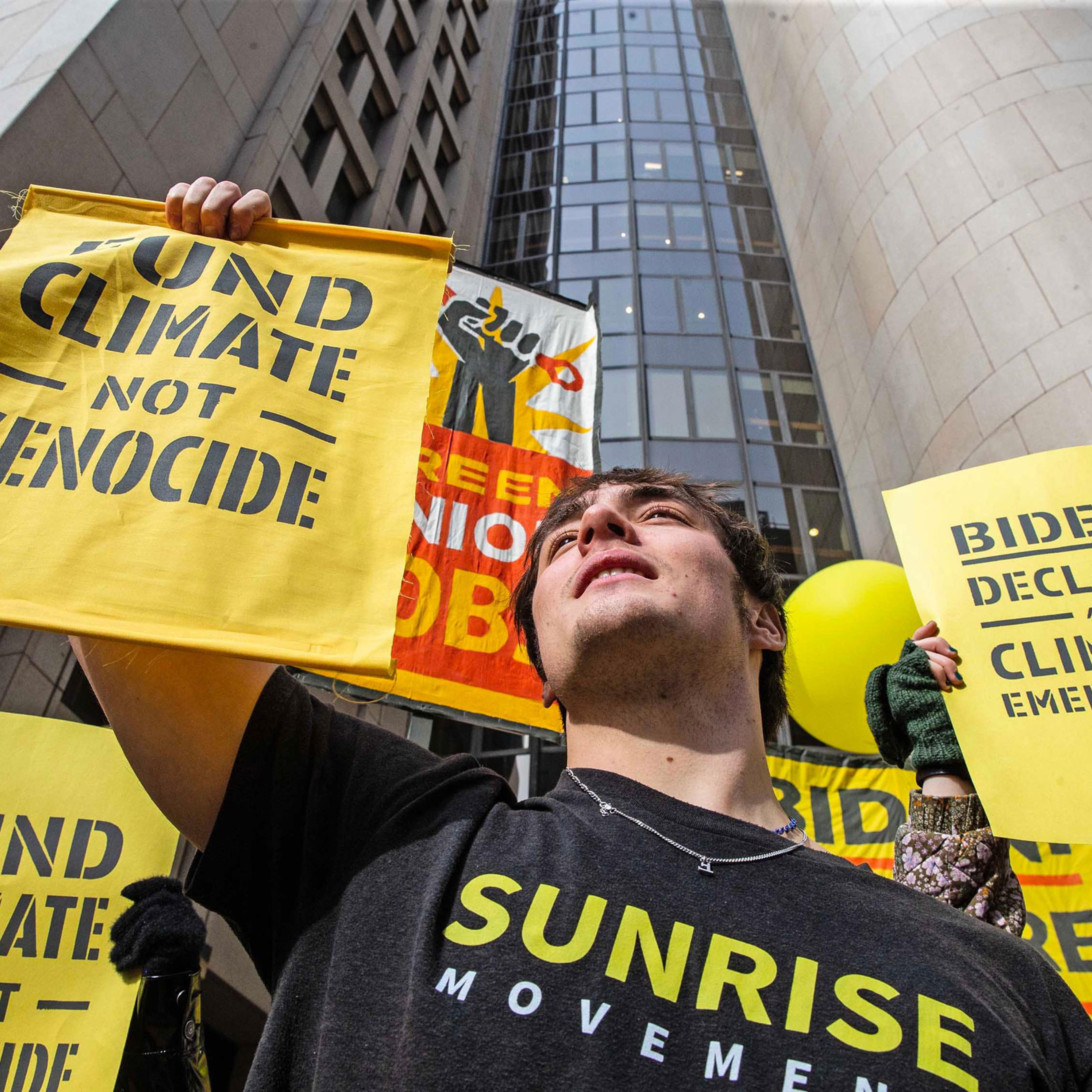 Youth from the Sunrise Movement participate in a climate protest outside of President Joe Biden’s 2024 campaign headquarters in Wilmington, Del., on Feb. 12, 2024.