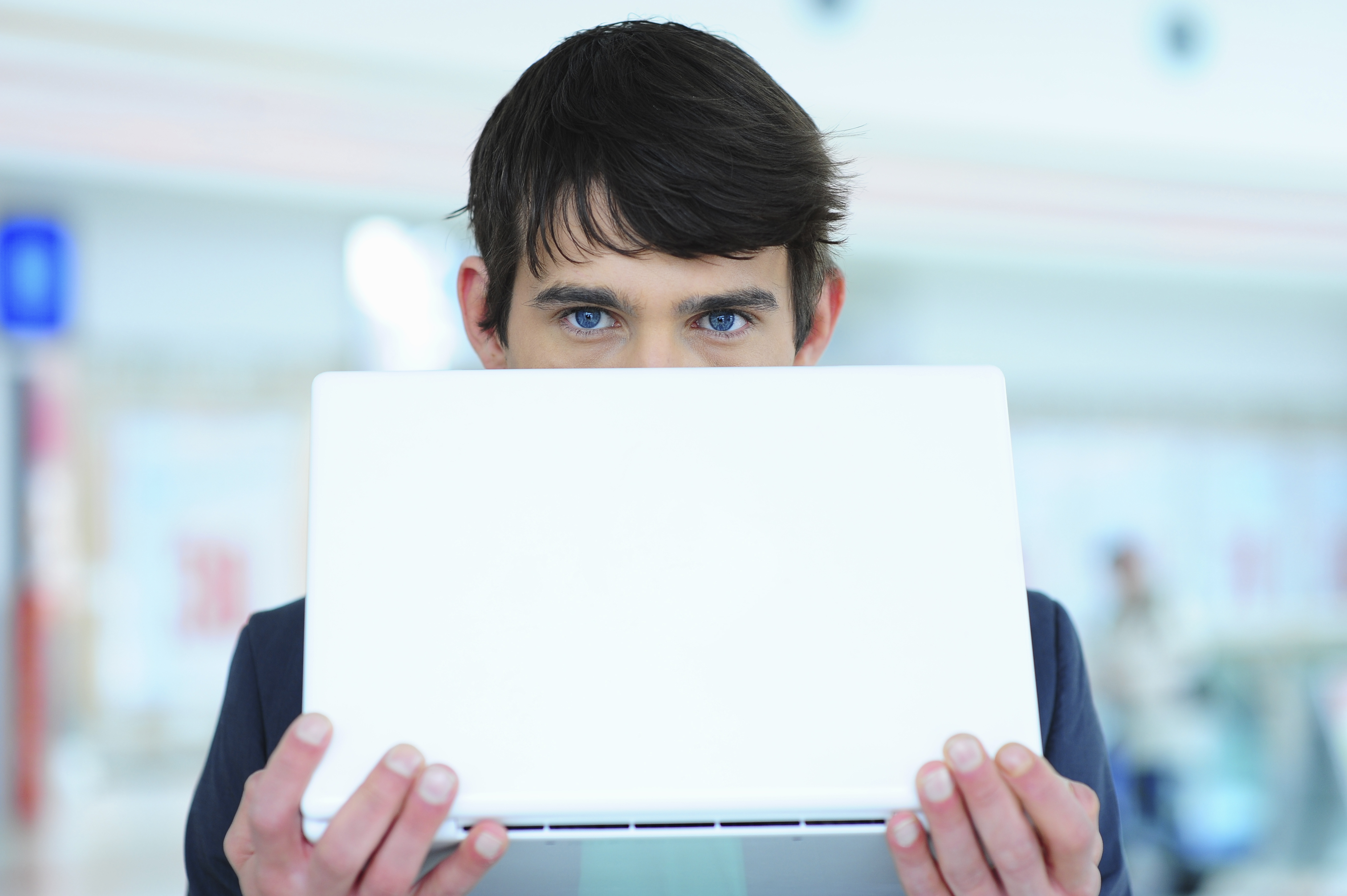 man-behind-laptop