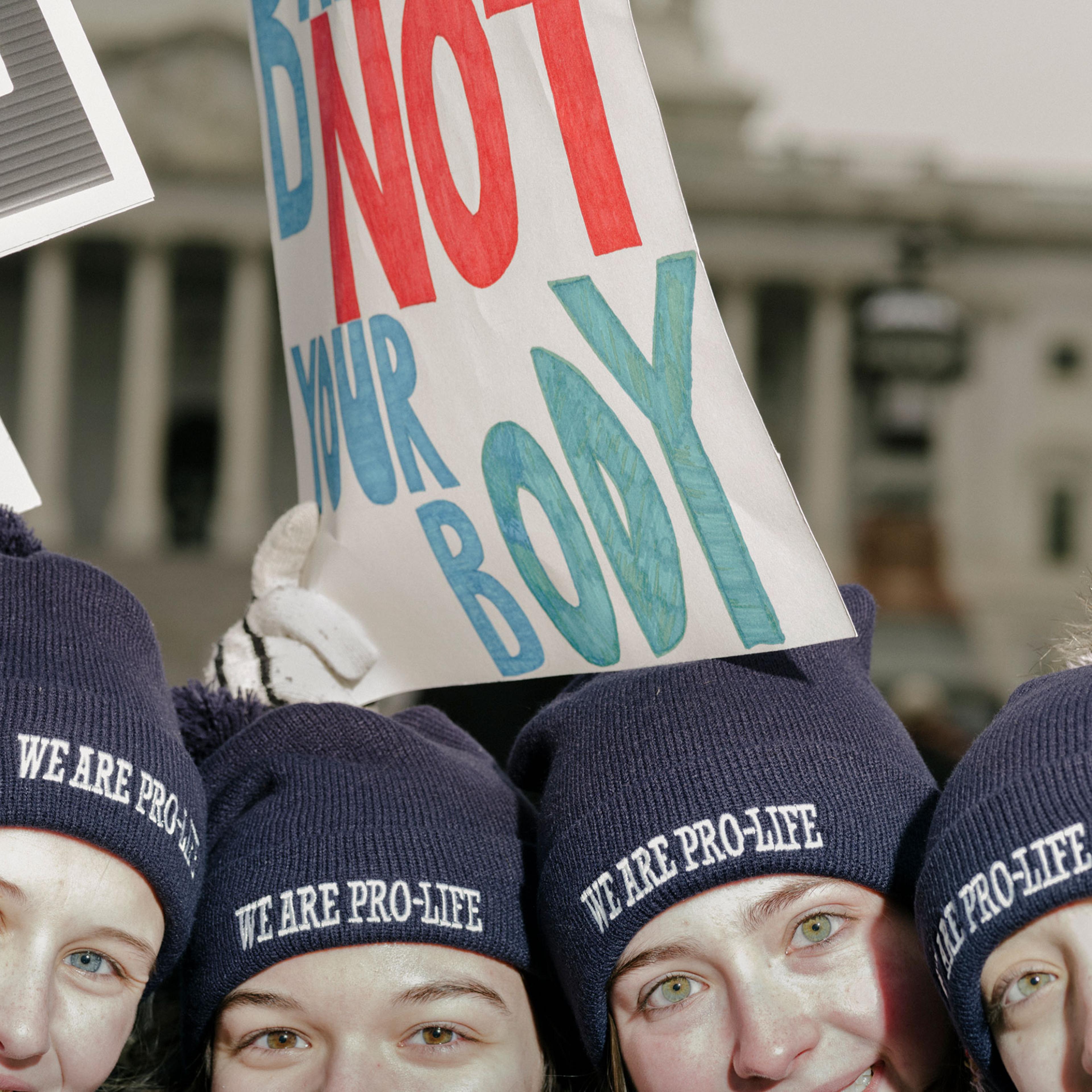 Attendees of the March for Life, held the day before the anniversary of the Supreme Court ruling of Roe v. Wade, stand in front of the Supreme Court building in Washington, on Jan. 21, 2022.