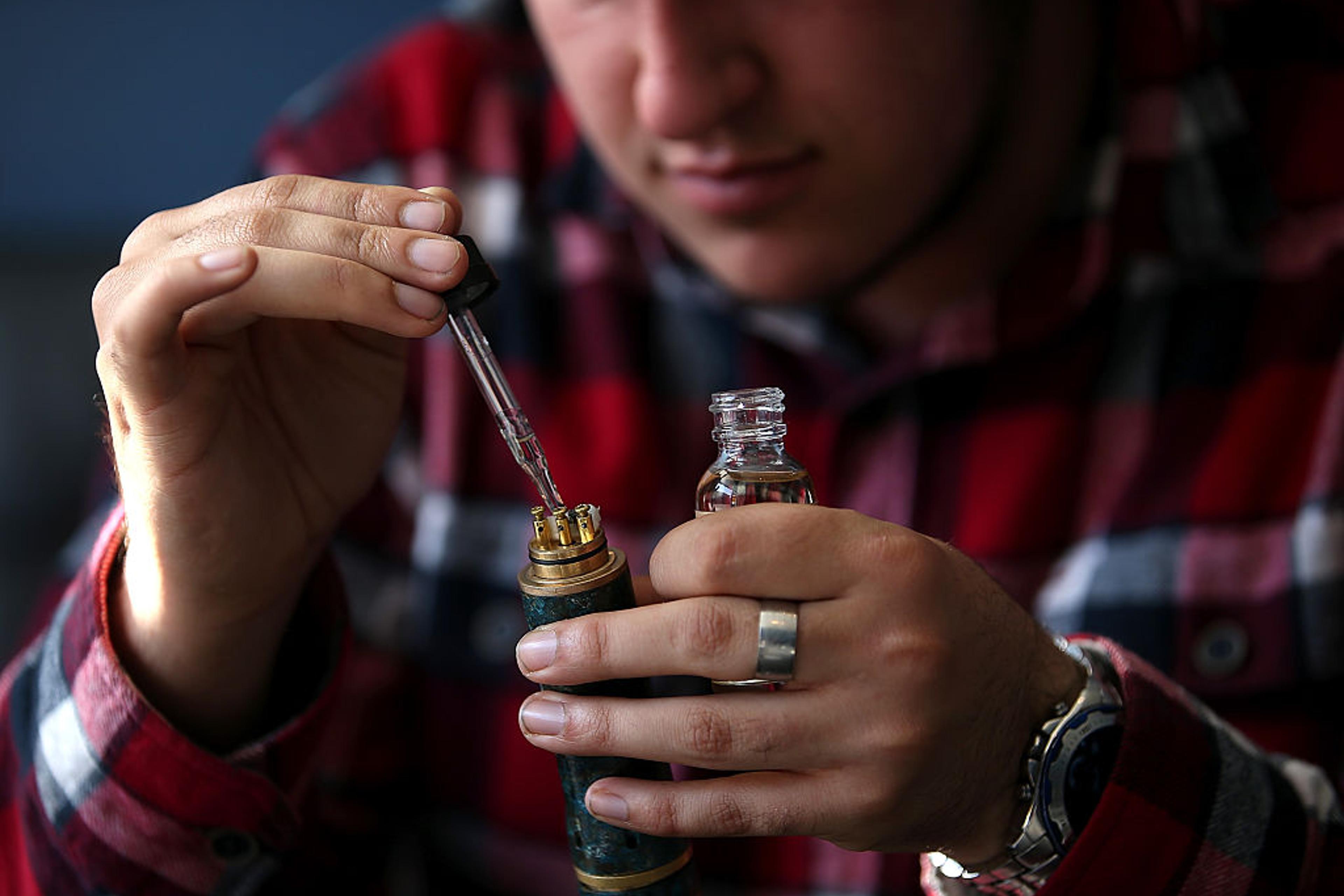 electronic cigarette oil This E-cigarette Additive May Be Causing Lung Illnesses in Vaping Outbreak, CDC Says 8,169 E Cig Shop Royalty-Free