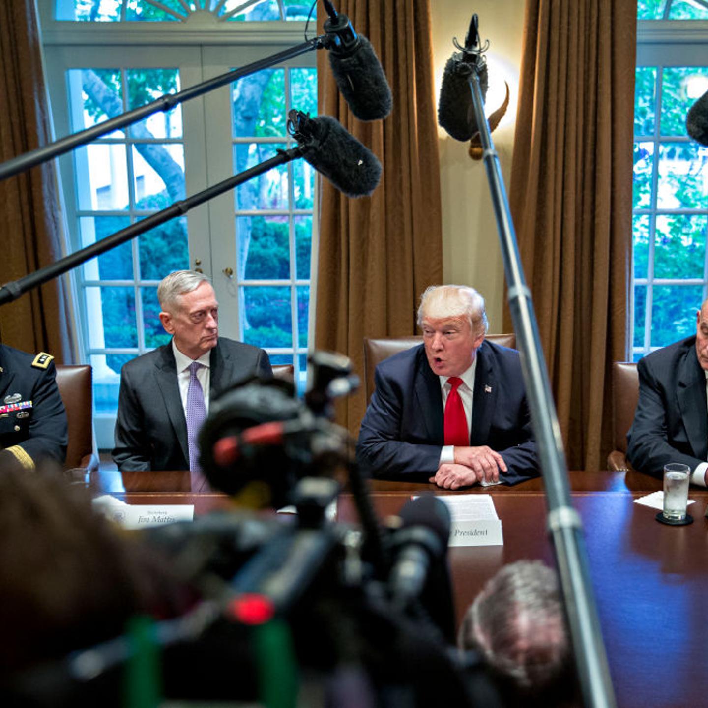 U.S. President Donald Trump (C), then national security advisor H.R. McMaster (L), Defense Secretary Jim Mattis (2nd L) and then White House chief of staff John Kelly (R) attend a briefing with senior military leaders in the Cabinet Room of the White Hou