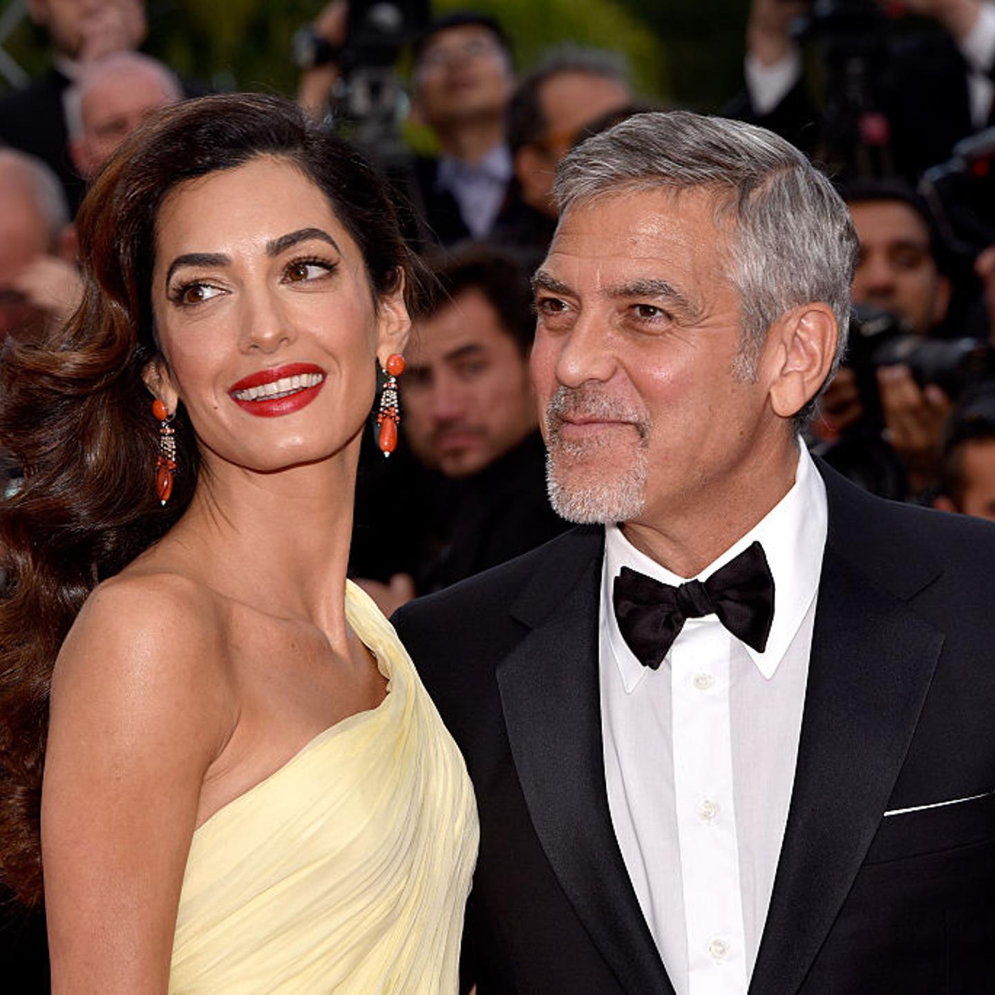 Actor George Clooney and his wife Amal Clooney attend the "Money Monster" premiere during the 69th annual Cannes Film Festival at the Palais des Festivals on May 12, 2016 in Cannes, France.