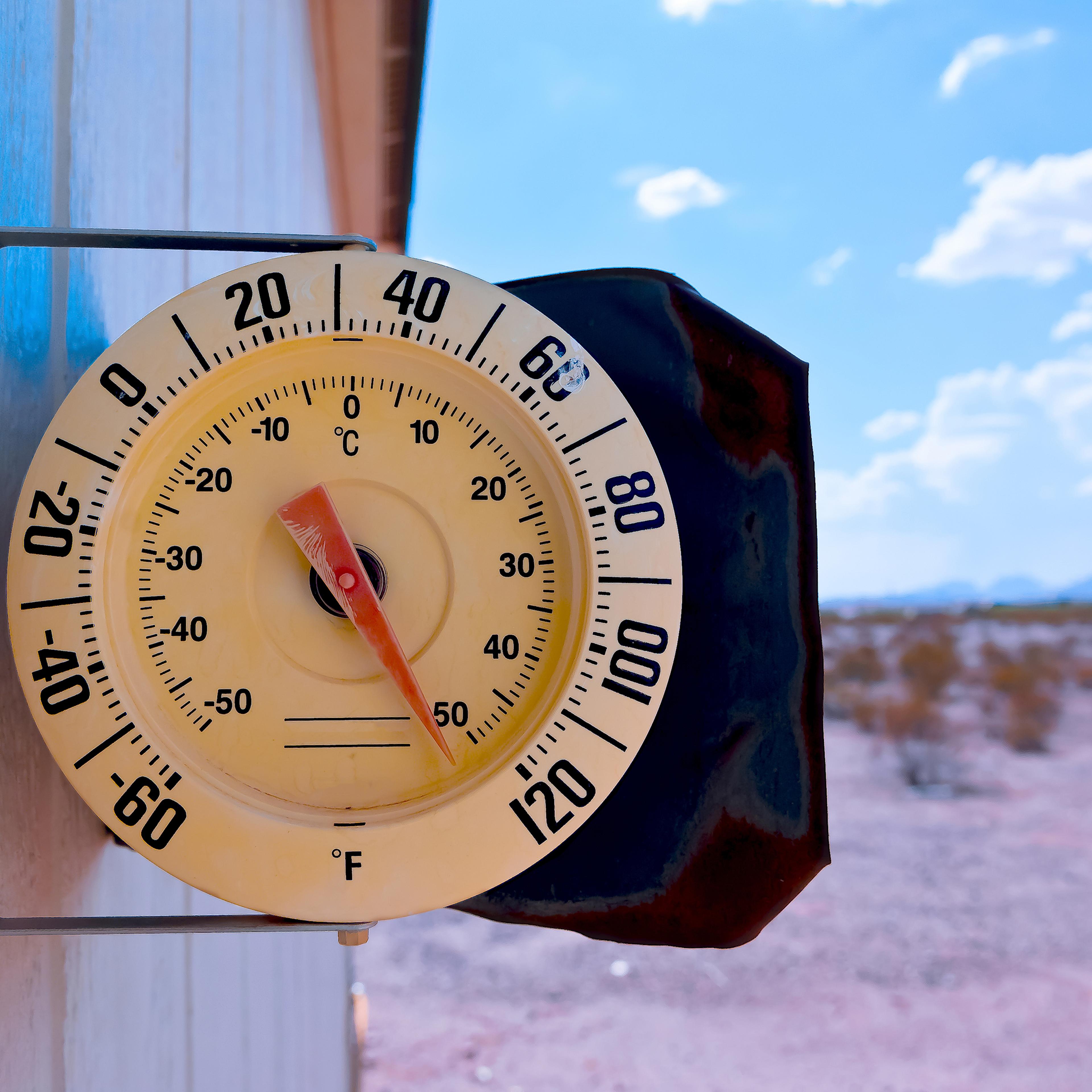 Thermometer on side of a house, Arizona, America, USA
