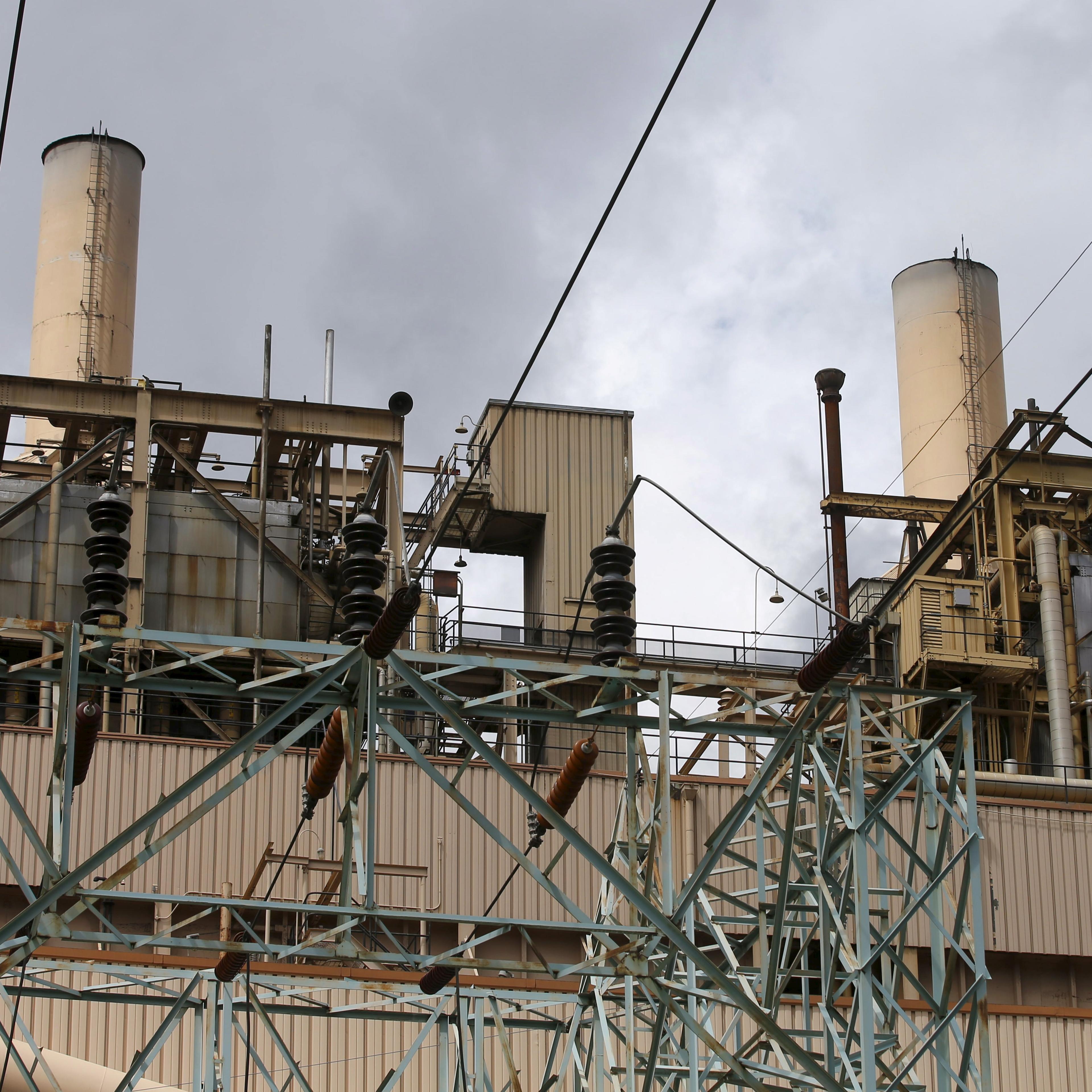 Electric power lines lead into the coal-fired Castle Gate Power Plant that is sitting idle and is no longer producing electricity outside Helper, Utah, Aug. 3, 2015. The plant was closed in the Spring of 2015 in anticipation of new EPA regulations.