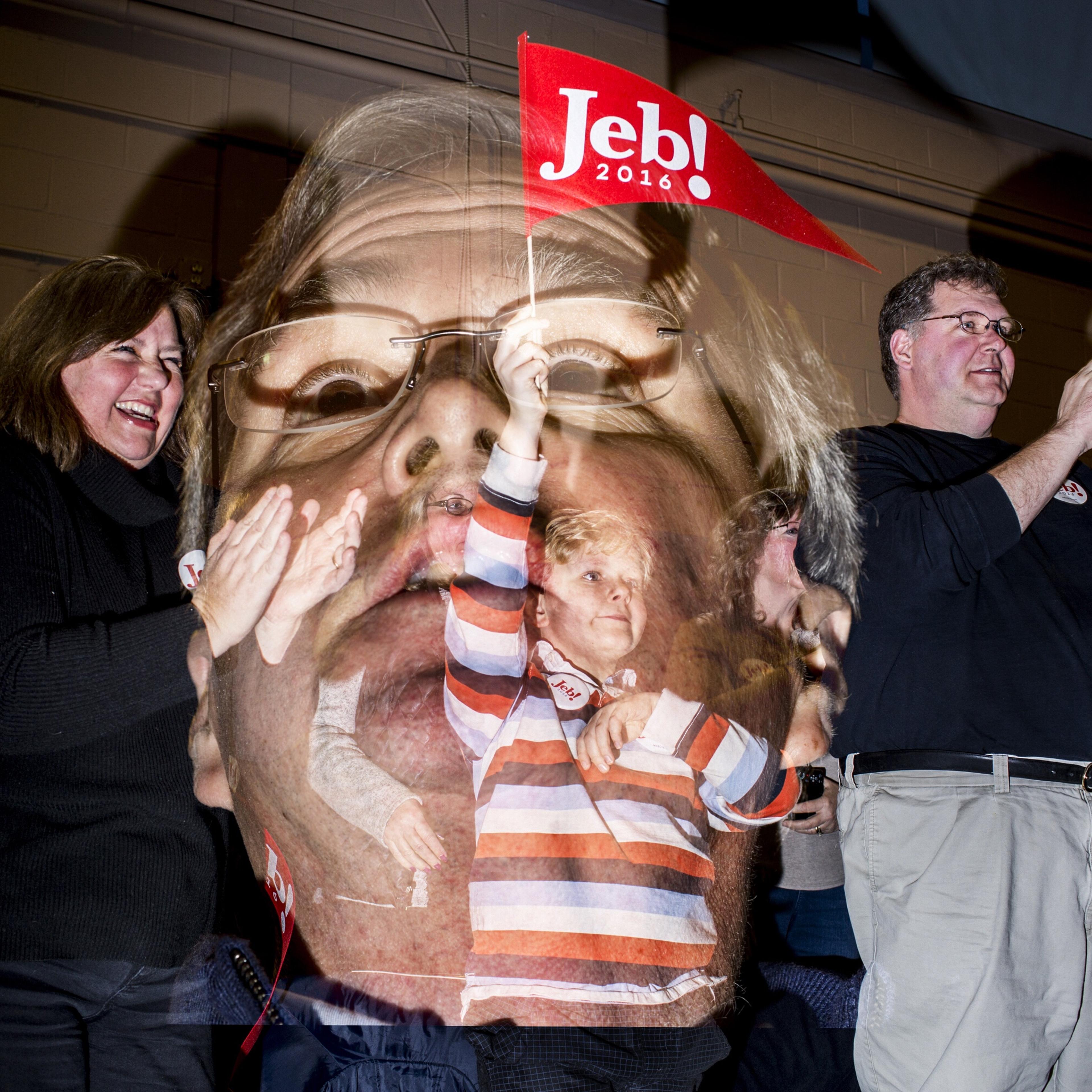 This double exposure image shows Republican presidential candidate Jeb Bush speaking to attendees at a town hall meeting in Pelham, N.H. on Jan 23, 2016.
