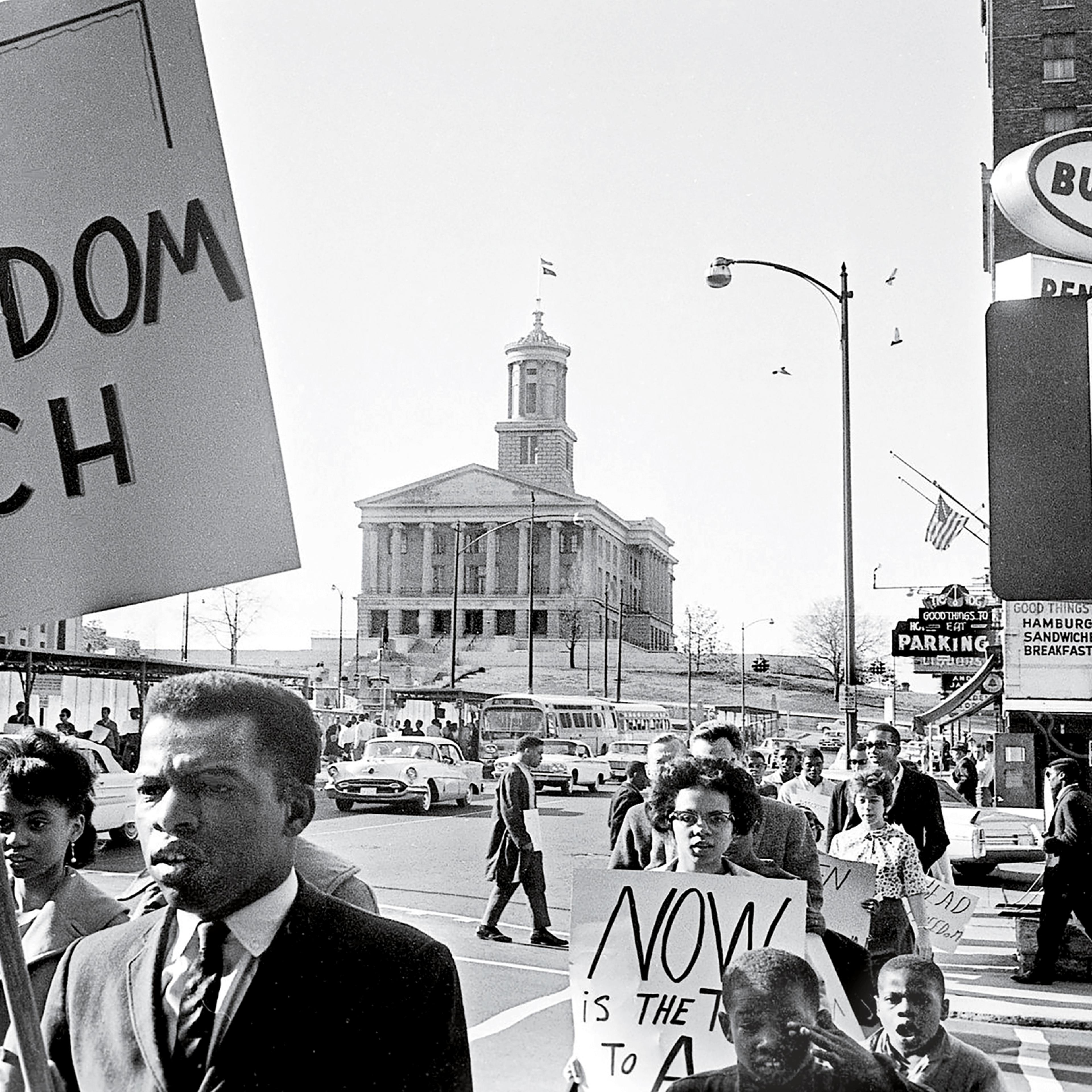 John Lewis, in the foreground holding a sign, demonstrates in downtown Nashville on March 23, 1963.