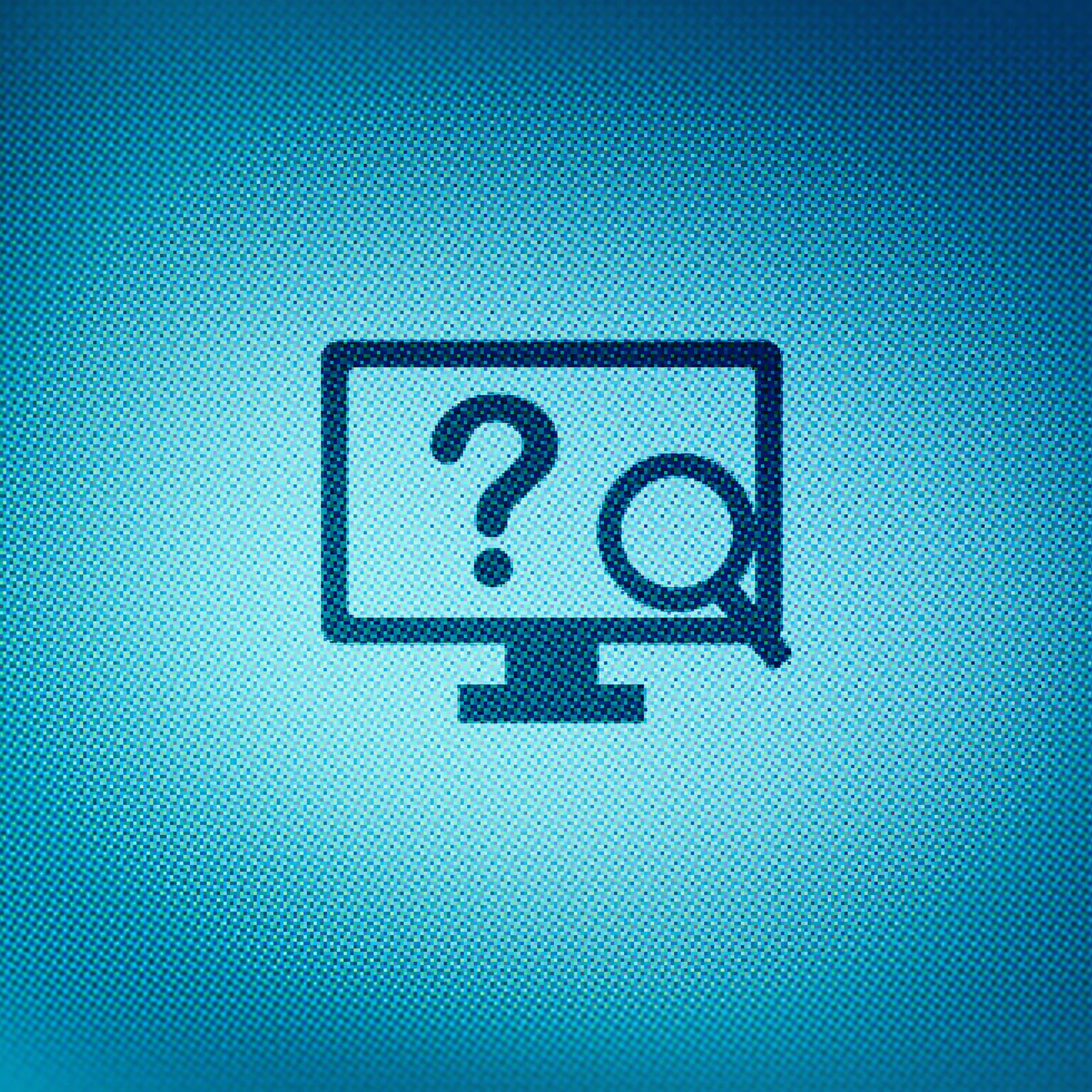 Close-up of desktop icon with magnifying glass on screen