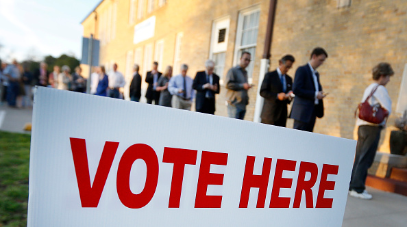 Voters line up to cast their ballots on Super Tuesday March 1, 2016 in Fort Worth, Texas.