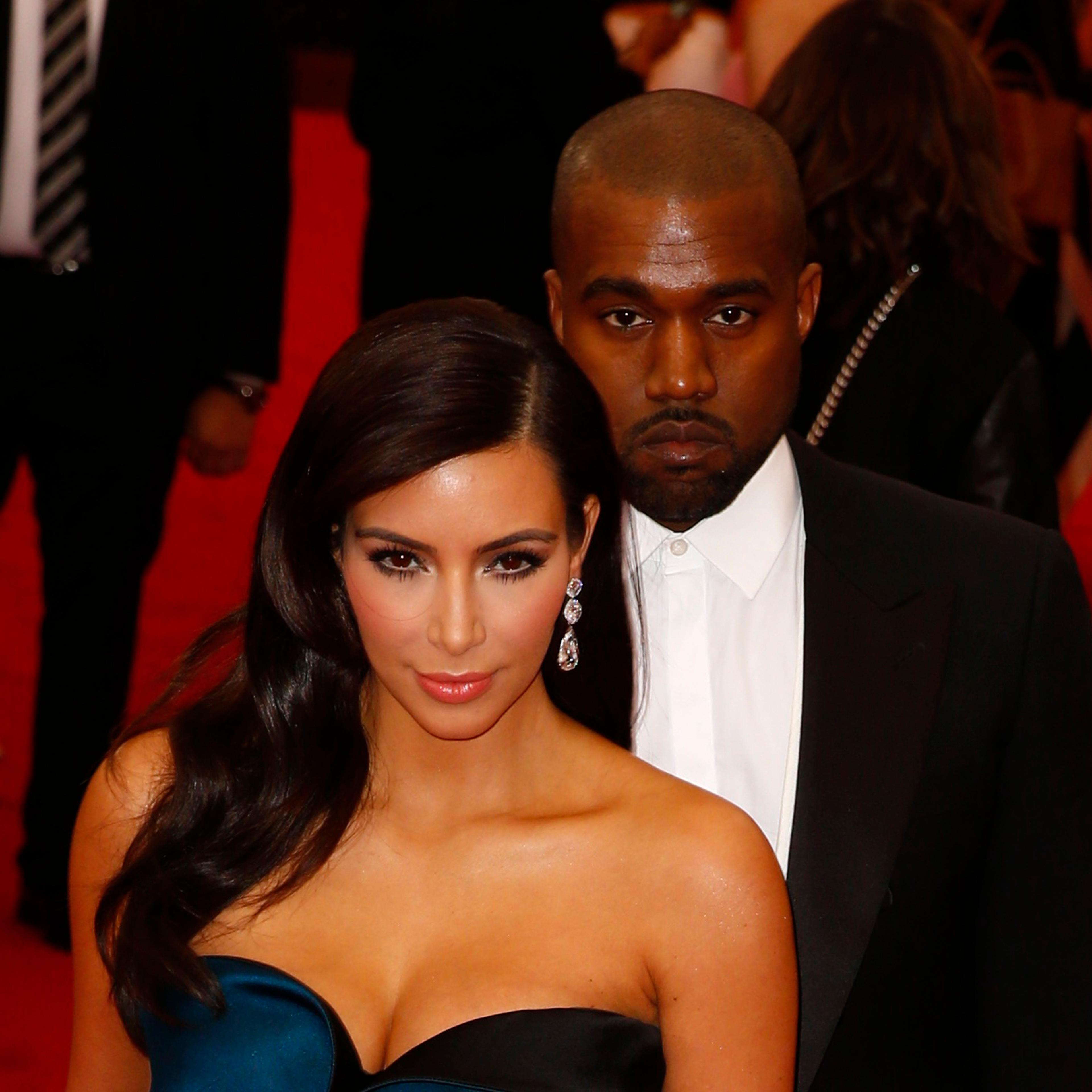 Kim Kardashian and Kanye West arrive at the Metropolitan Museum of Art Costume Institute Gala Benefit celebrating the opening of "Charles James: Beyond Fashion" in New York