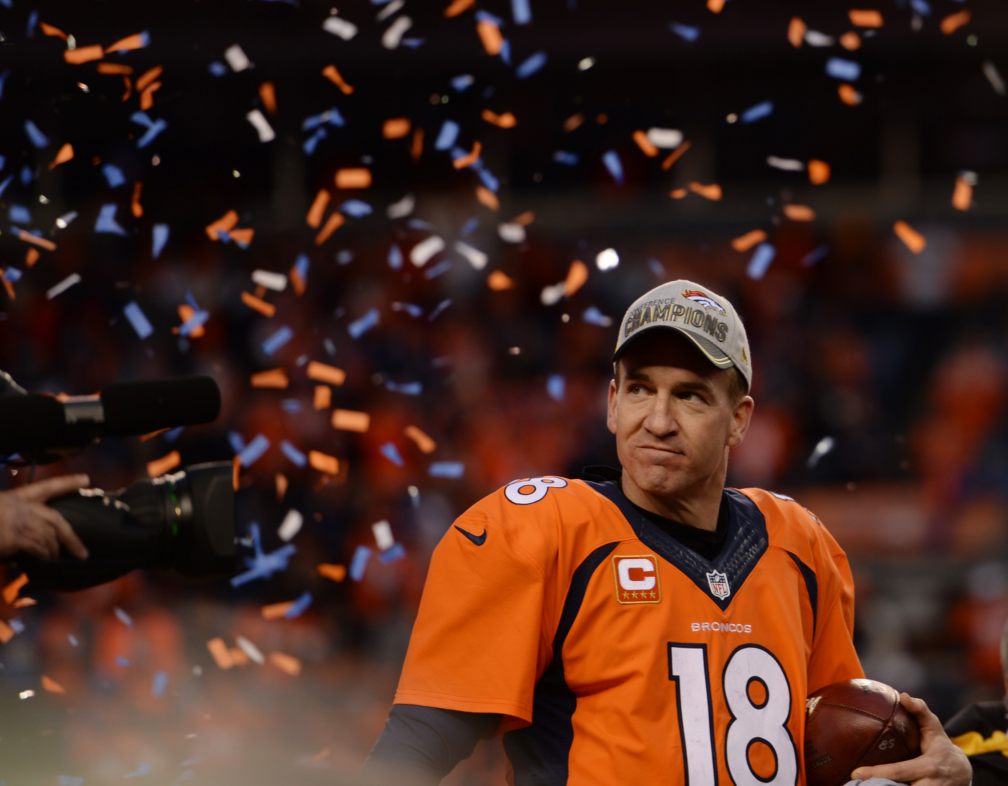 Peyton Manning celebrates after winning the AFC championship game against New England Patriots at Sports Authority Field at Mile High Stadium in Denver, January, 24, 2016.