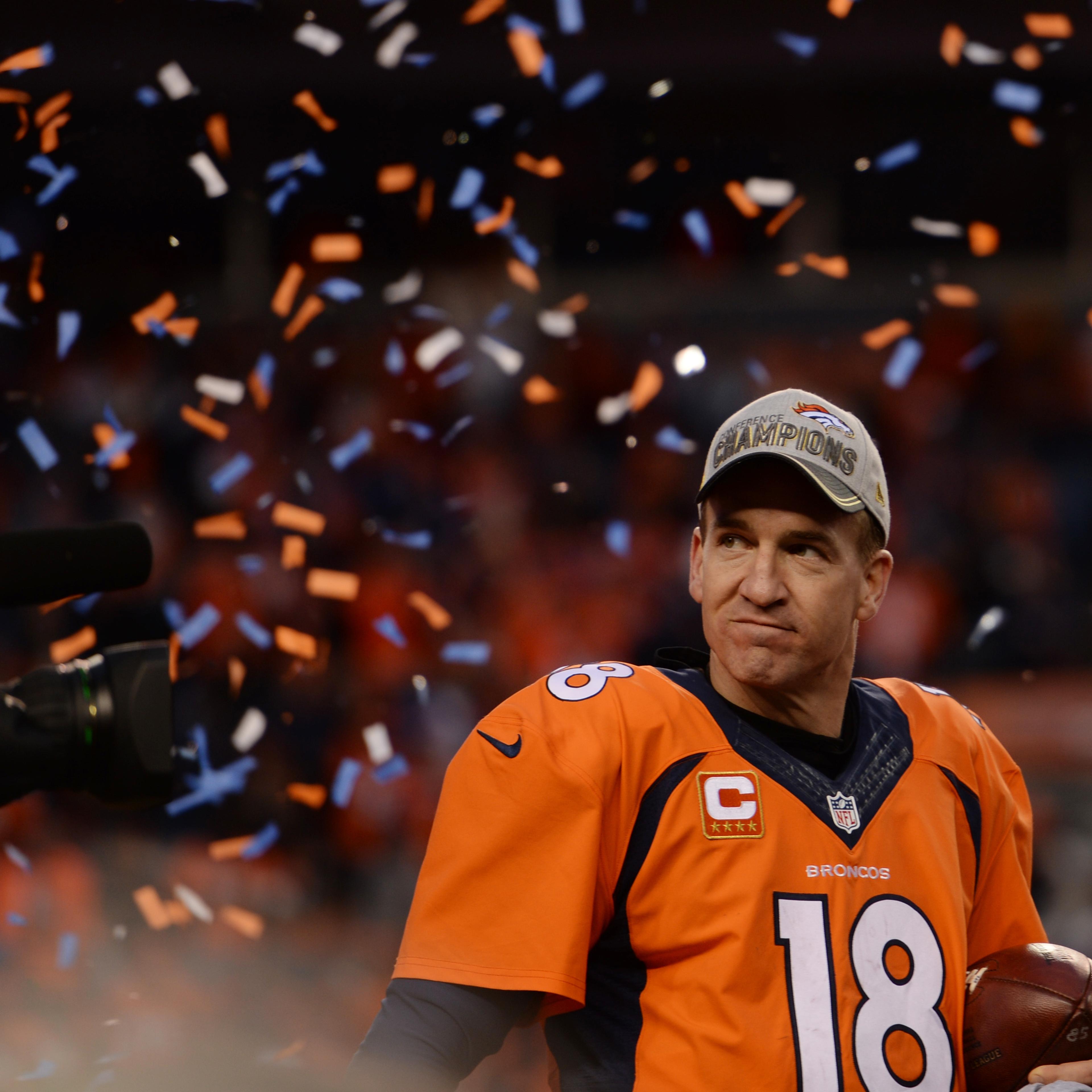Peyton Manning celebrates after winning the AFC championship game against New England Patriots at Sports Authority Field at Mile High Stadium in Denver, January, 24, 2016.