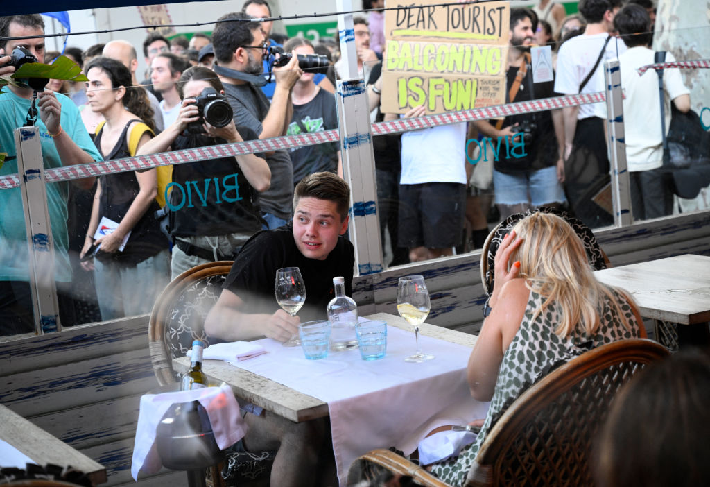 Demonstrators during a protest against mass tourism in Barcelona.