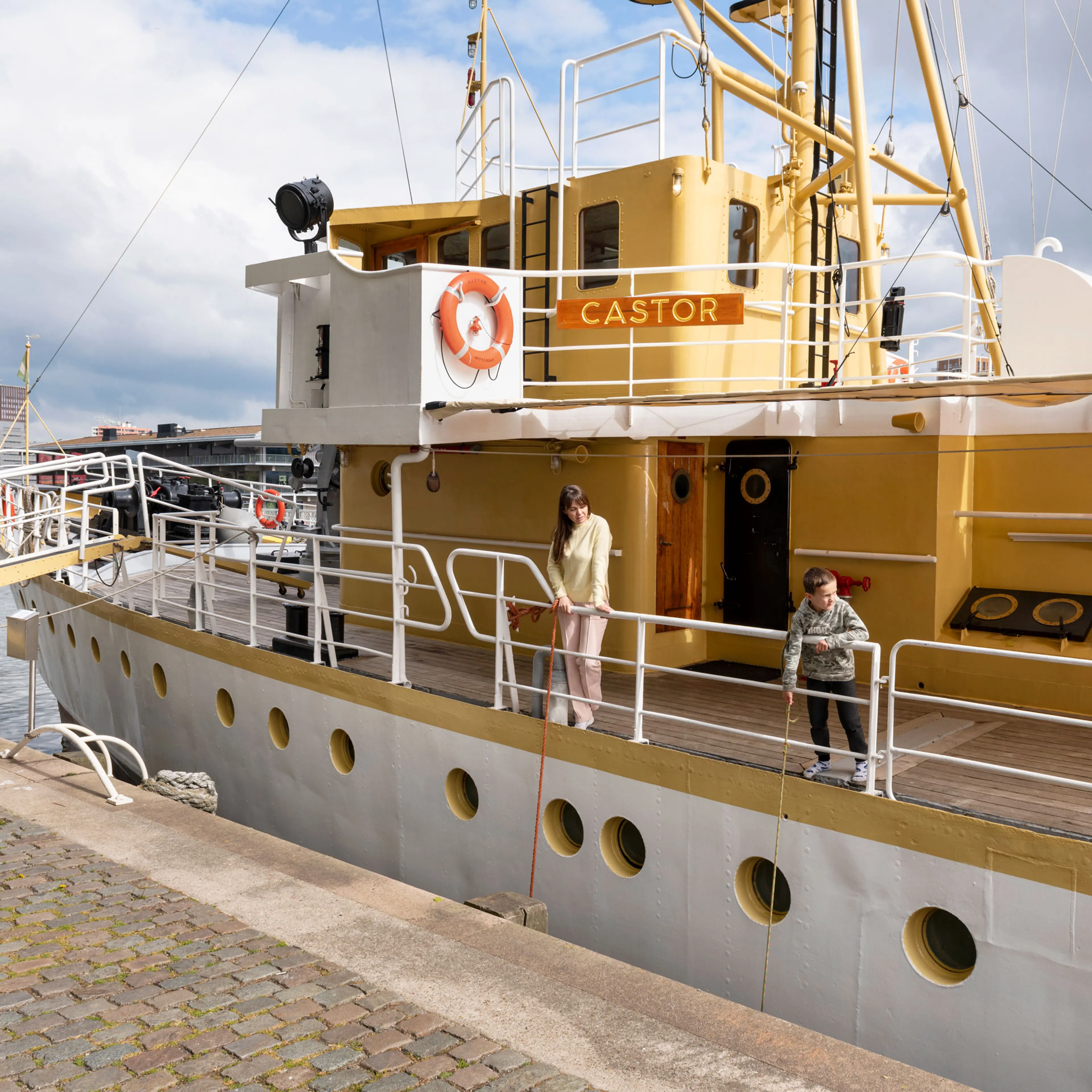 Julia and Danilo Martyshkina stand aboard the M.L.V Castor