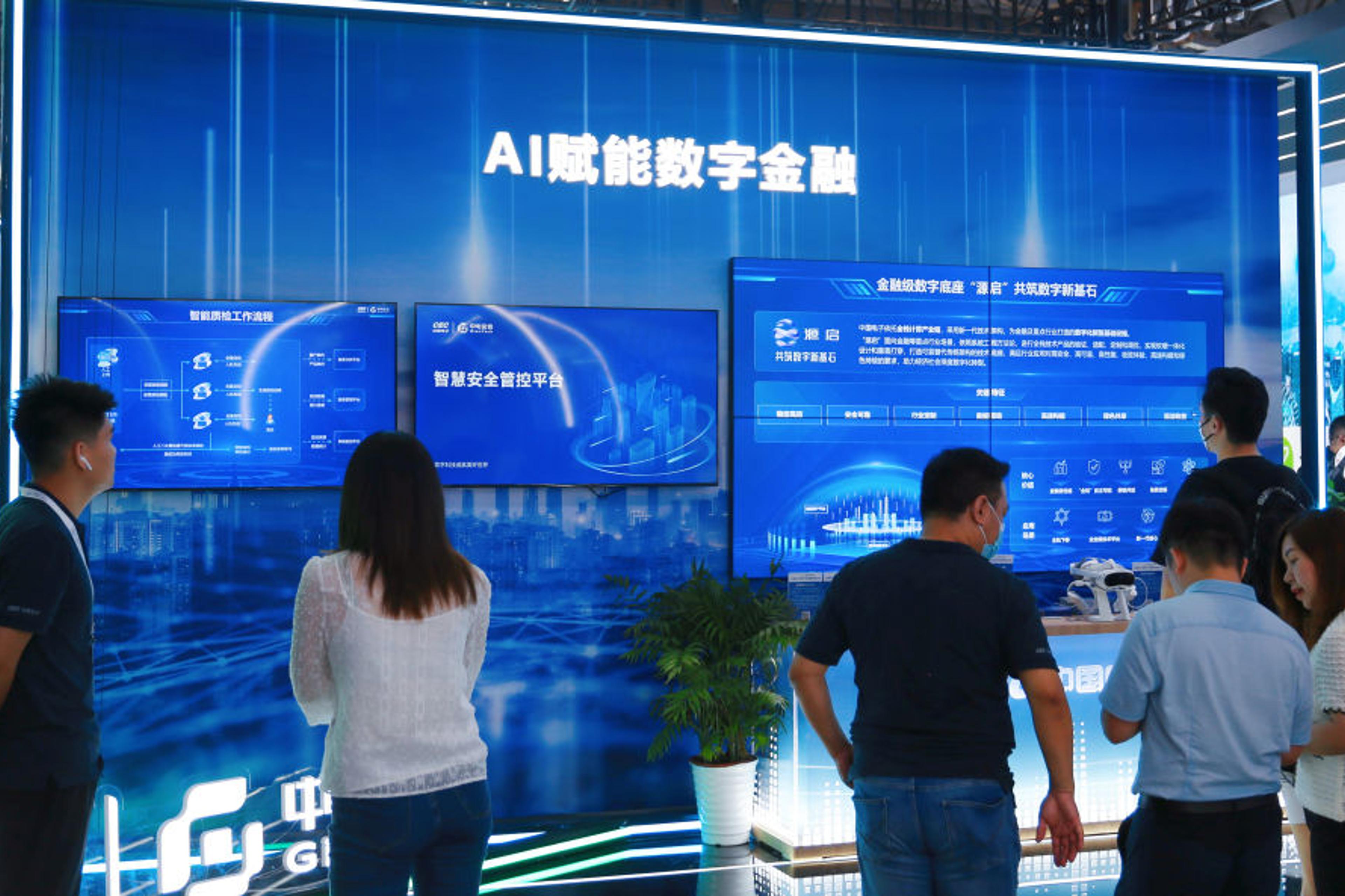 Visitors visit the China Electronics booth at the 2023 World Artificial Intelligence Conference in Shanghai, China, July 7, 2023.