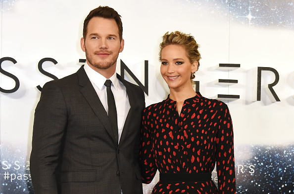 Chris Pratt (L) and Jennifer Lawrence pose at a photocall for 'Passengers' at Claridge's Hotel on December 1, 2016 in London, England.