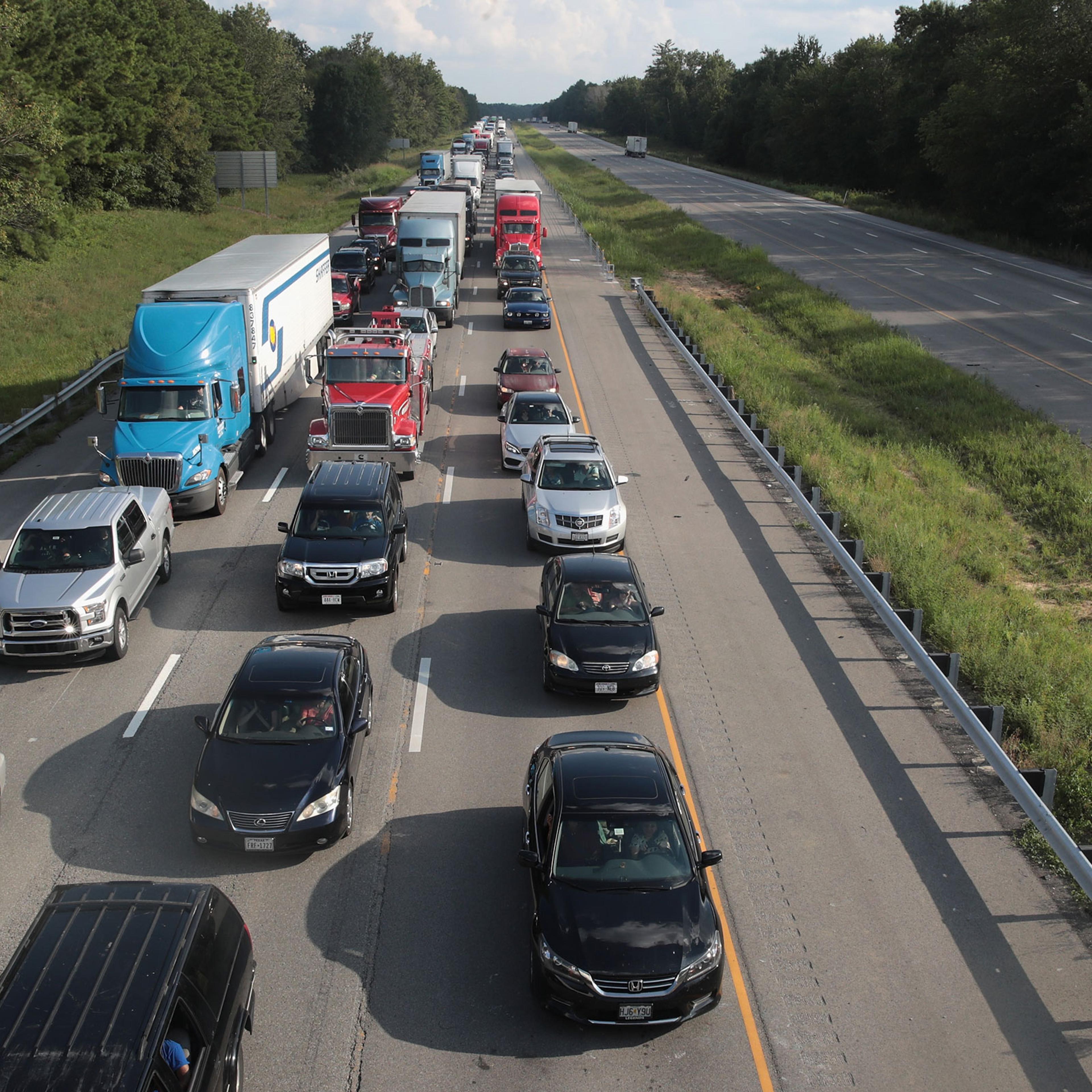 Traffic is backed up in the northbound lanes of Interstate 57 following the solar eclipse near Johnston, Ill., on Aug. 21, 2017.