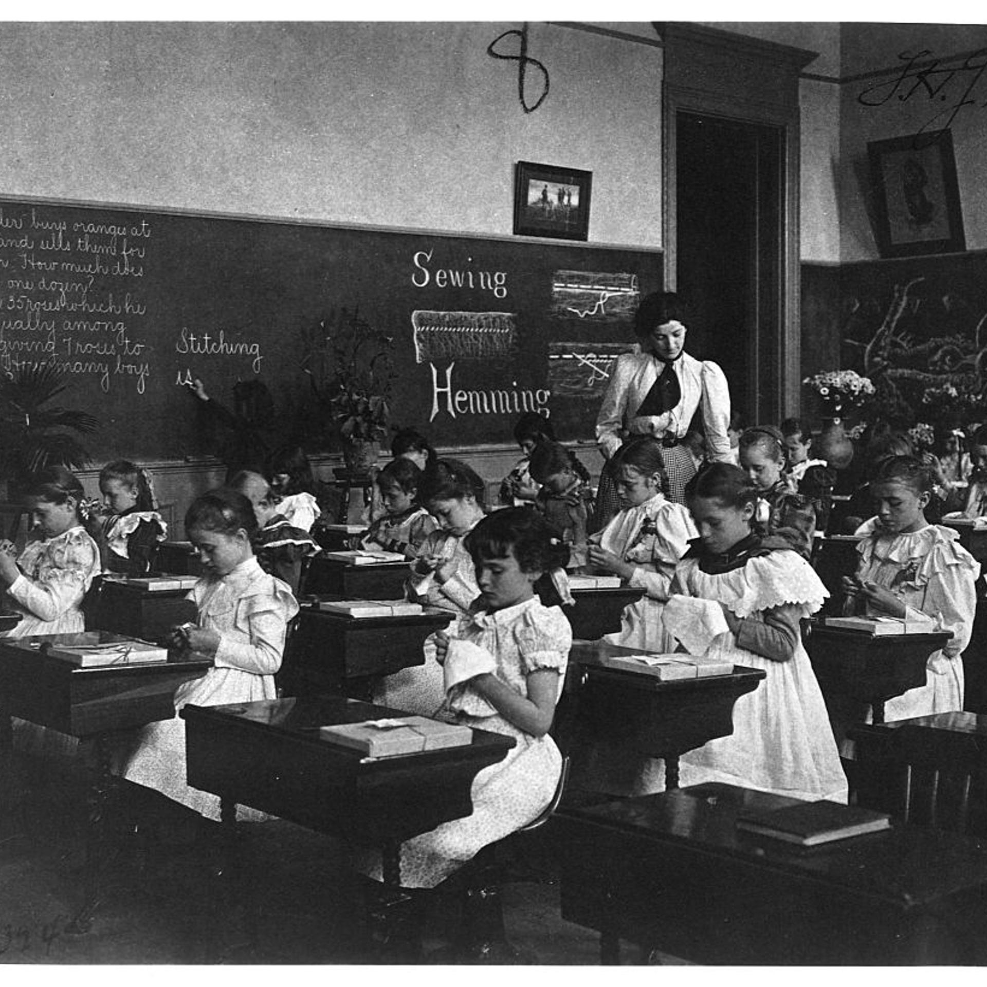Elementary School Girls Learning Sewing