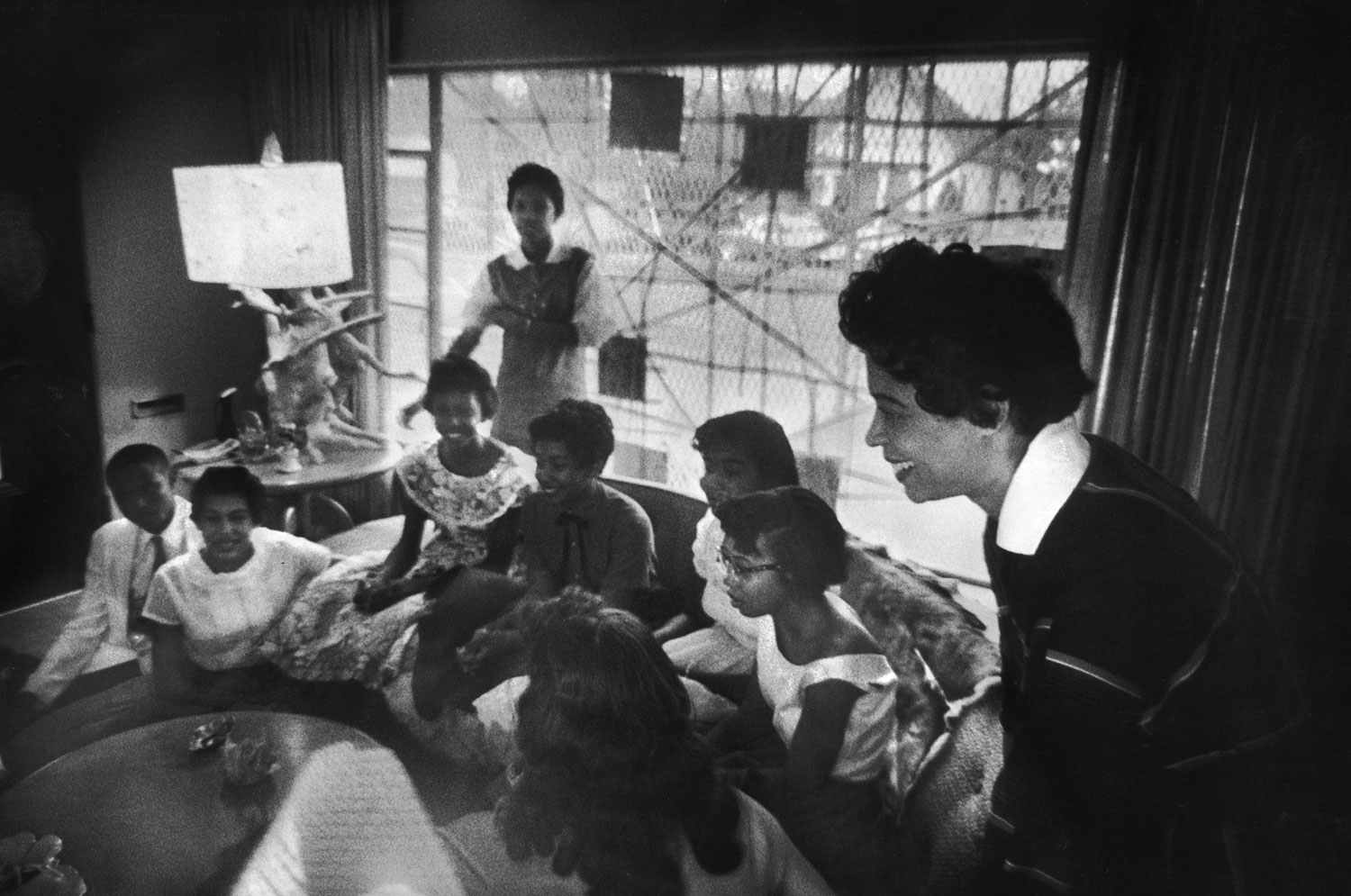 Mrs. Daisy Bates, NAACP leader, meets with African-American students that have been denied admittance to public schools, Little Rock, Arkansas, 1957.