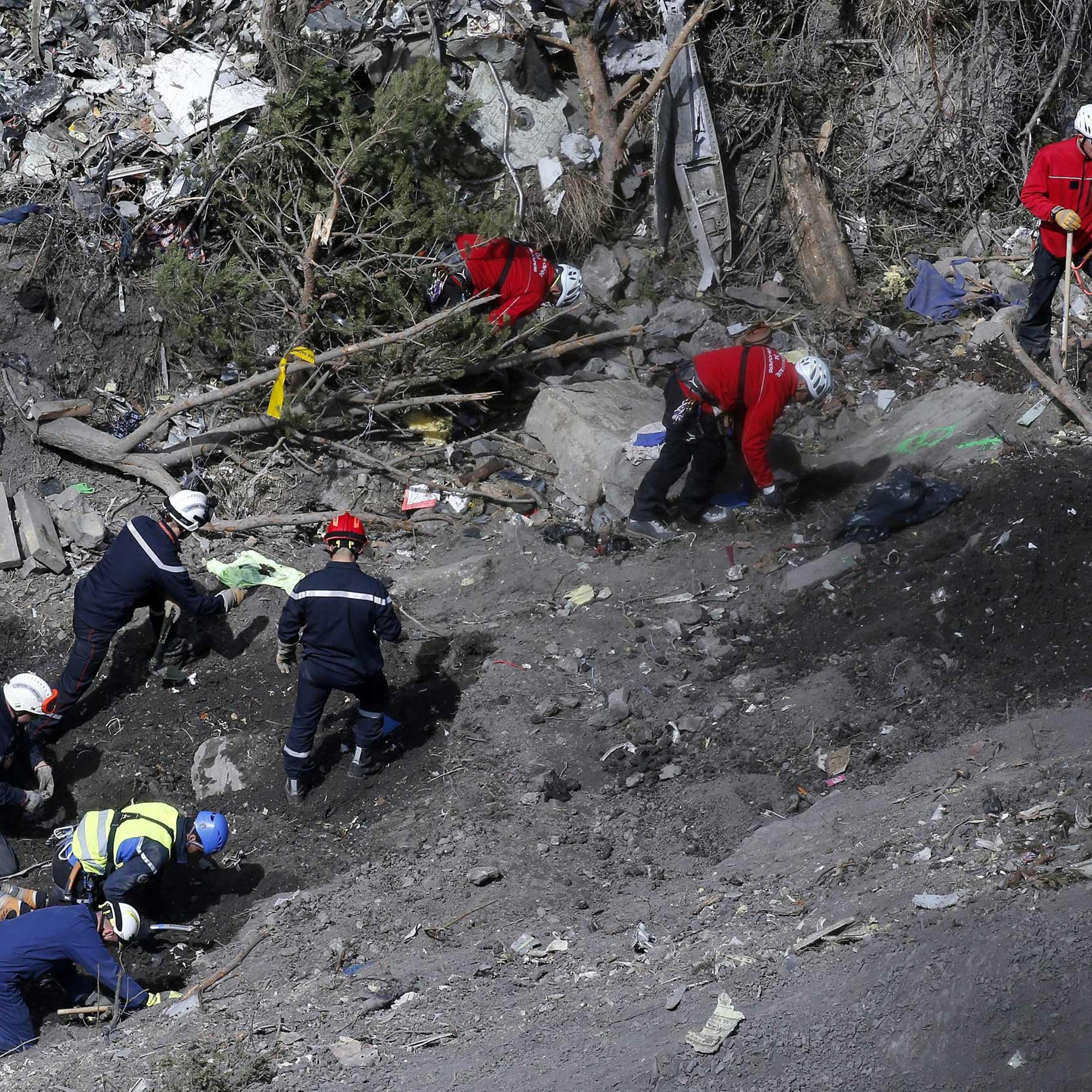 Searchers work to collect debris and find the second black box resume at the crash site of the Germanwings Airbus A320 in the French Alps, above the town of Seyne-les-Alpes, southeastern France, March 29, 2015.