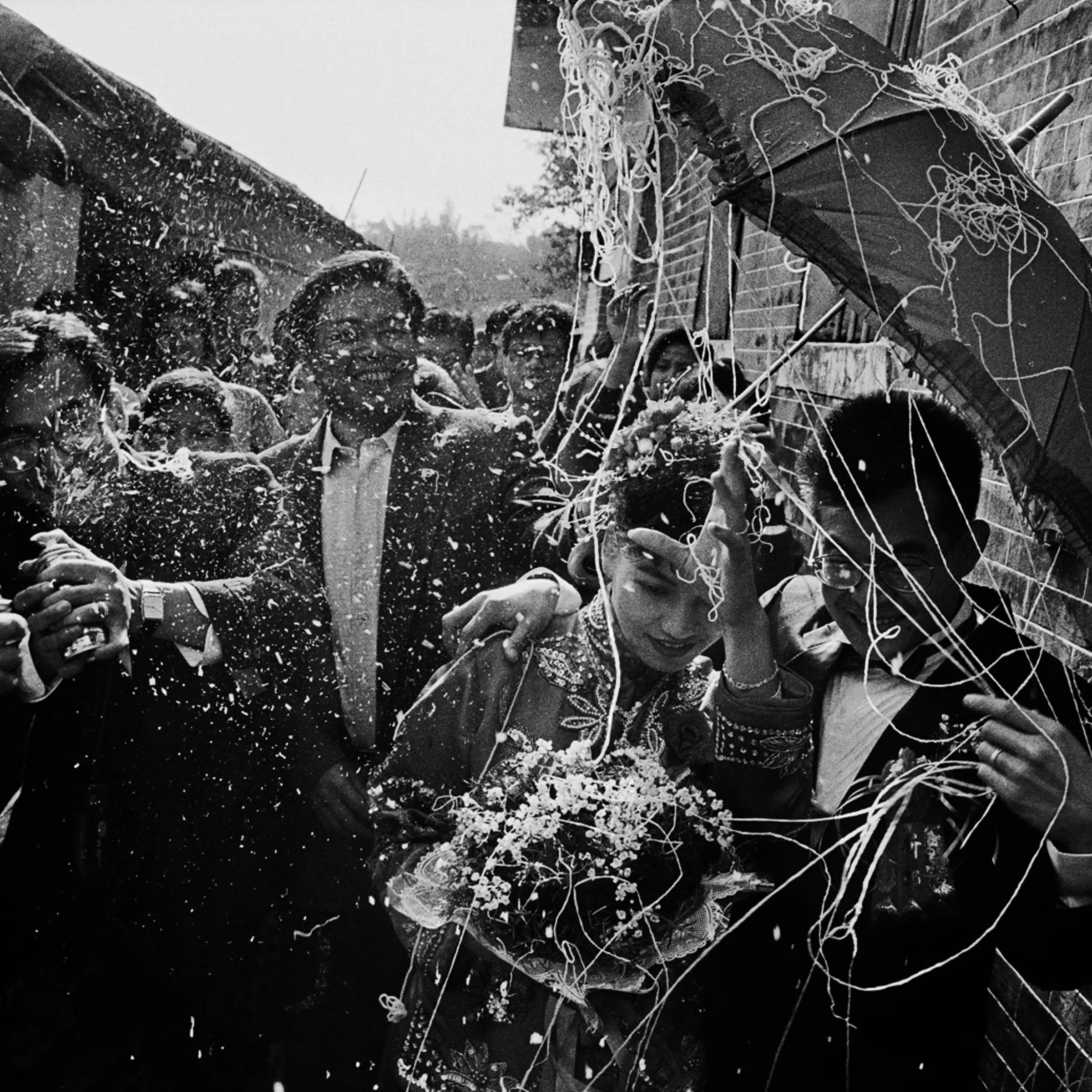 Julio Yun at his wedding with a Chinese woman from Na Jin. The wedding was arranged from New York by his parents. Village of Na Jin, Province of Guangdong, China, 1992.