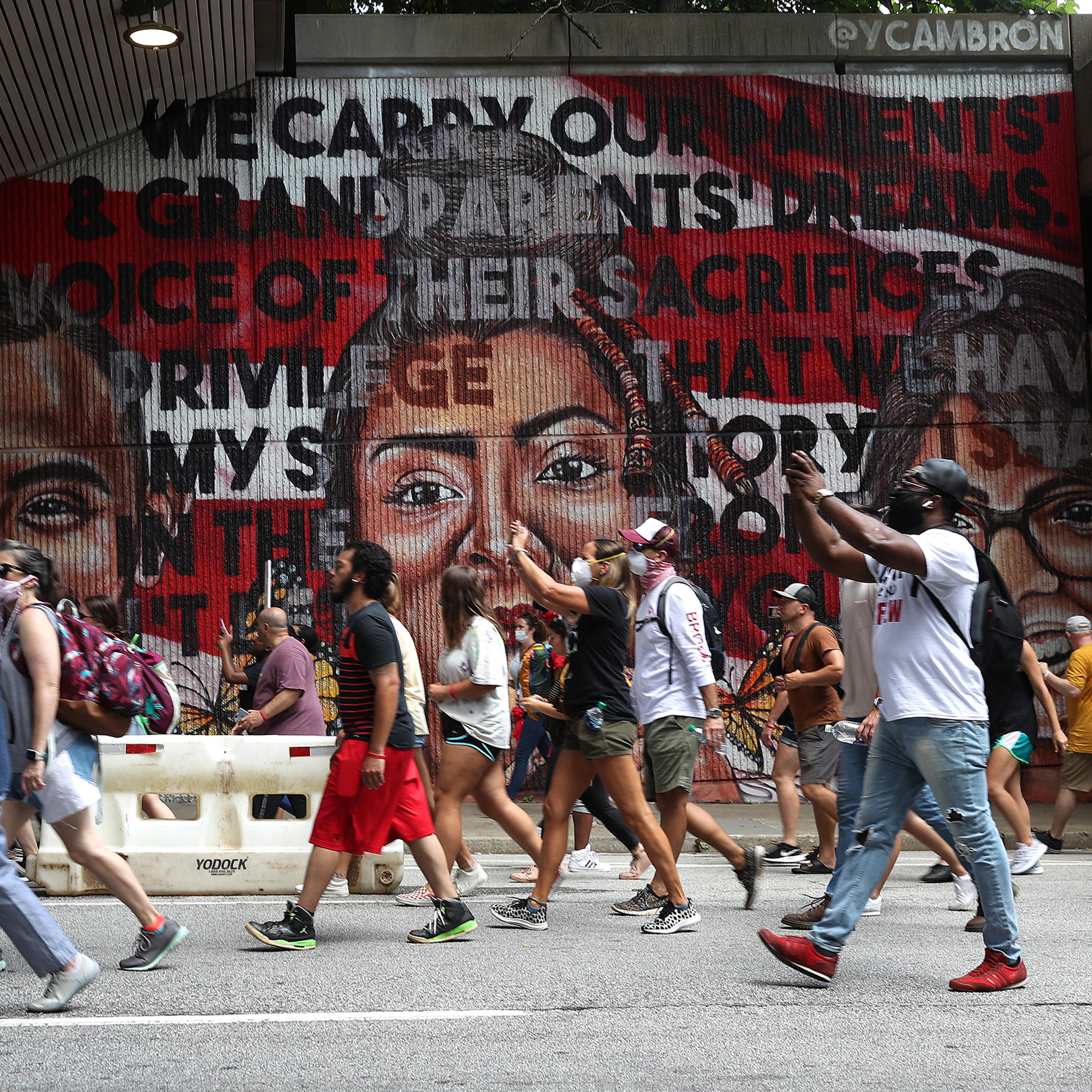 People march to the Georgia State Capitol during a Juneteenth event organized by the One Race Movement on June 19 in Atlanta