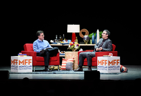 Stephen Colbert(L) and John Oliver (R) onstage at the Post-Election Evening to Benefit Montclair Film Festival at NJ Performing Arts Center on November 19, 2016 in Newark, New Jersey.