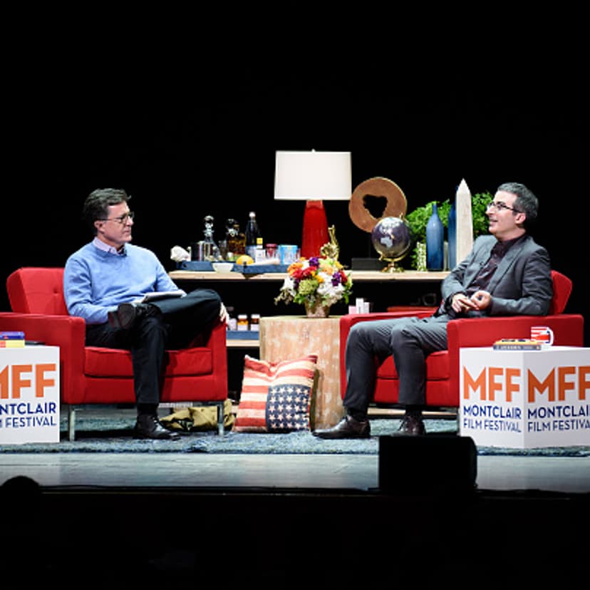Stephen Colbert(L) and John Oliver (R) onstage at the Post-Election Evening to Benefit Montclair Film Festival at NJ Performing Arts Center on November 19, 2016 in Newark, New Jersey.