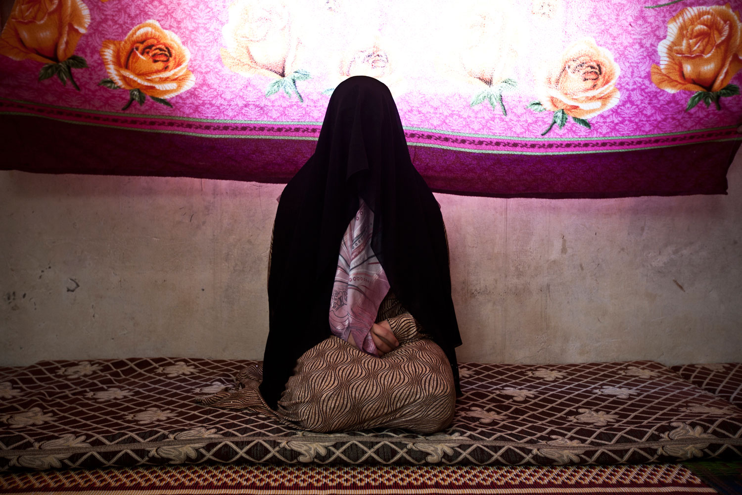 <i>All photographs taken in Jdeideh, Faqaa and Tripoli, Lebanon in 2012. </i></br></br>
Rasha, 27, from Soran</br>
Jdeideh</br>
Aside from her husband and two children, all of Rasha's family is still in Syria, including a brother who is serving in the Army. She is concerned he might get killed by the Free Syrian Army in her village. "As a Syrian, personally, I don't know what freedom is," she said. She does not want to return to Syria. 


