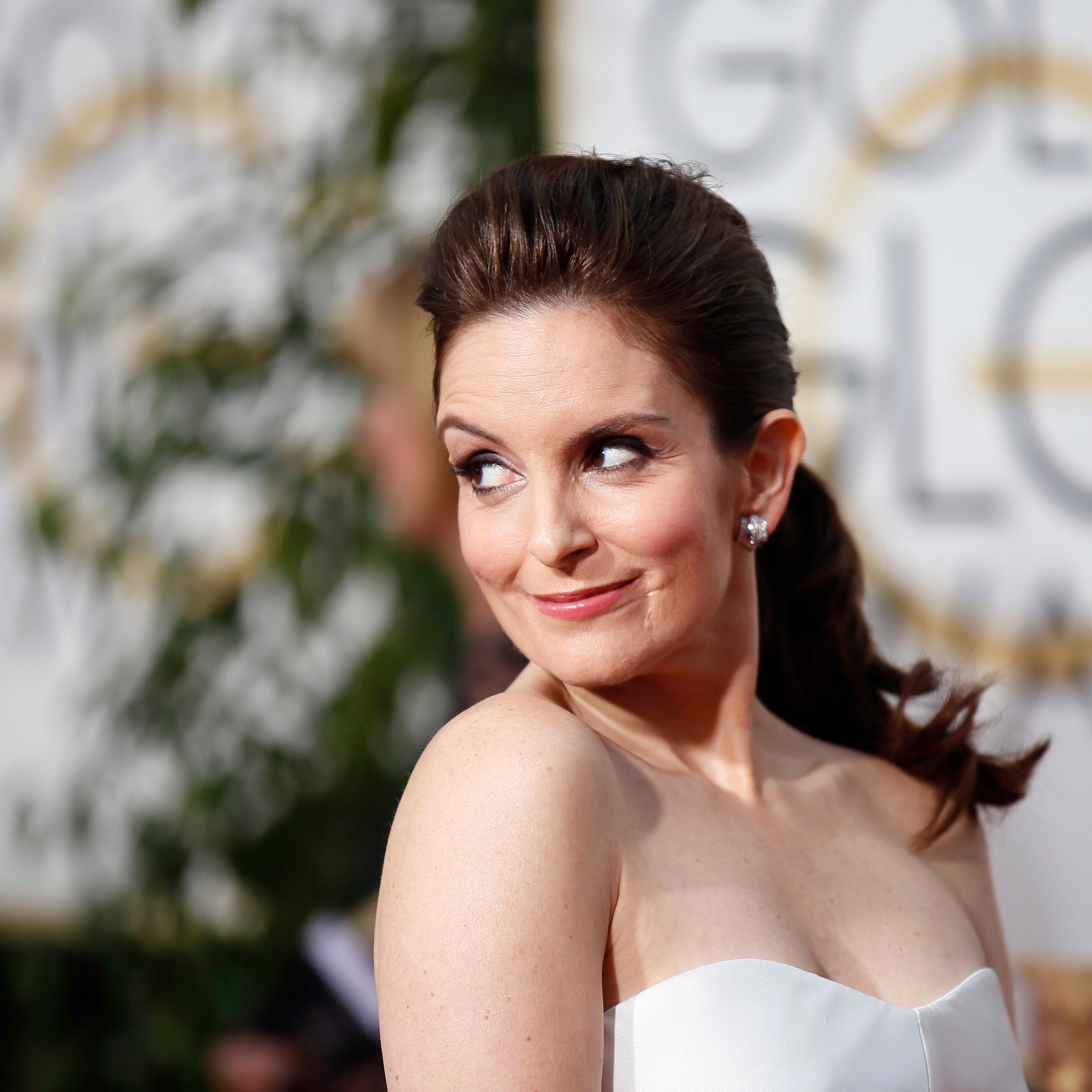 Tina Fey arrives at the 72nd Golden Globe Awards in Beverly Hills