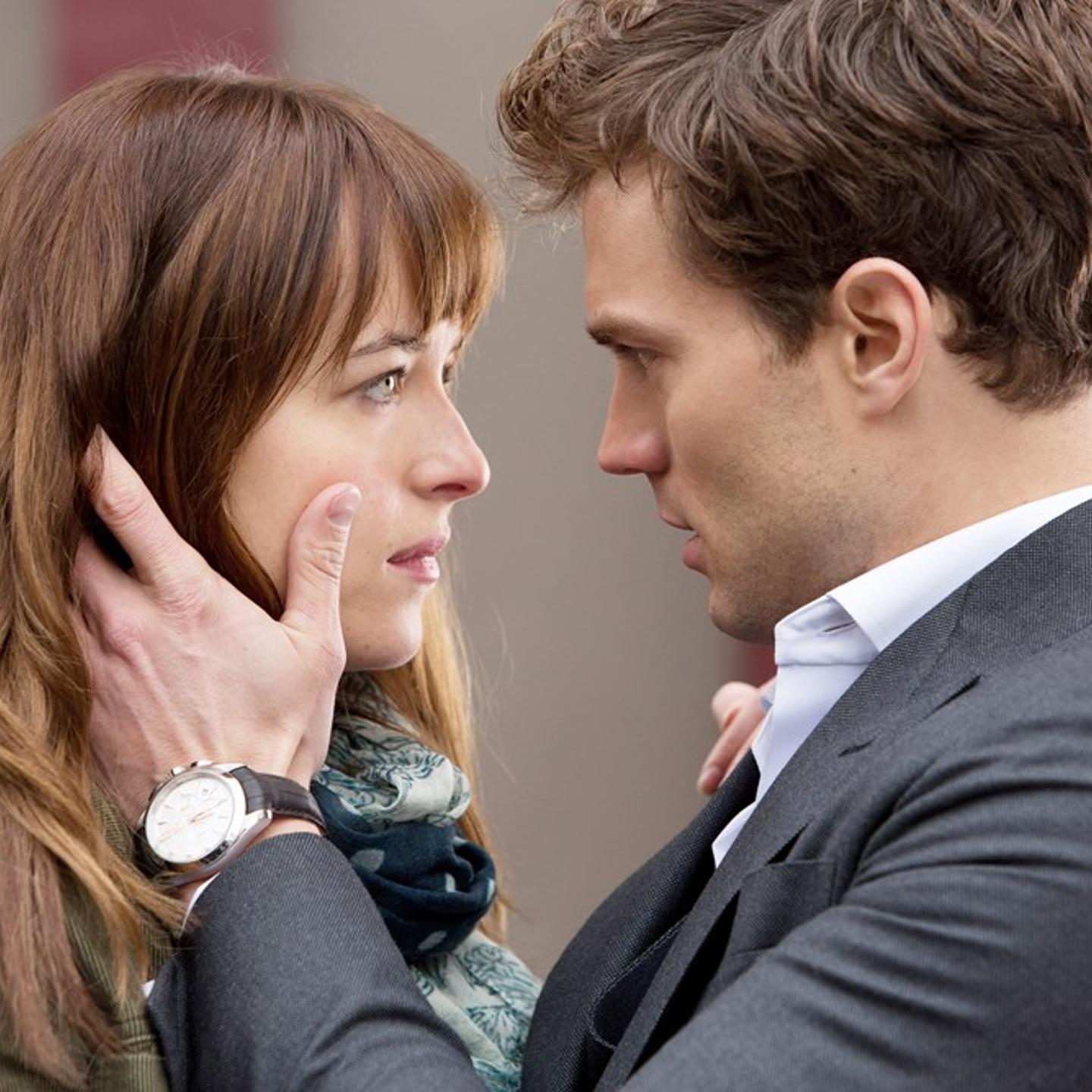 Dakota Johnson (L) and Jamie Dornan (R) in "Fifty Shades of Grey."