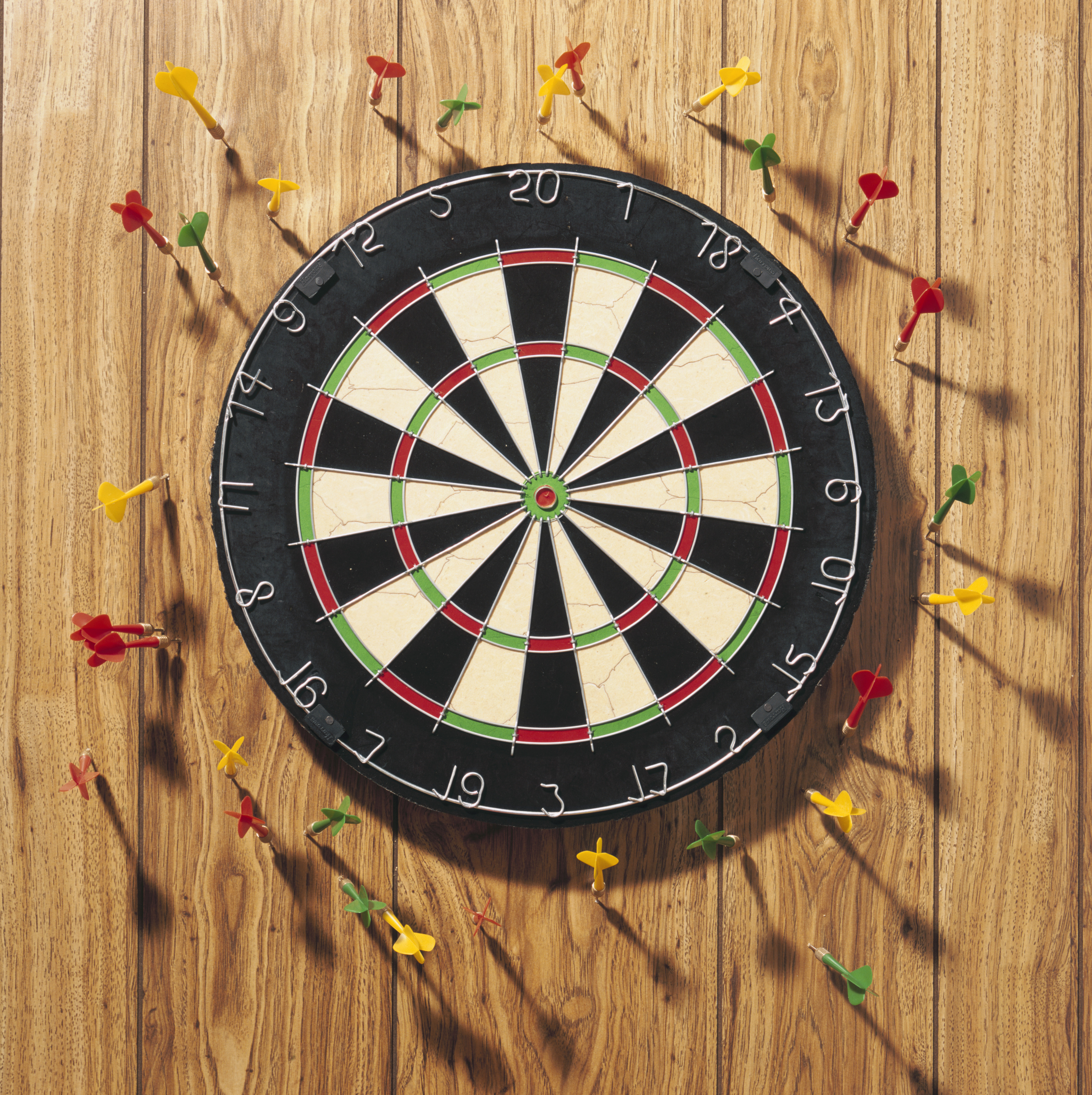 darts-around-dartboard