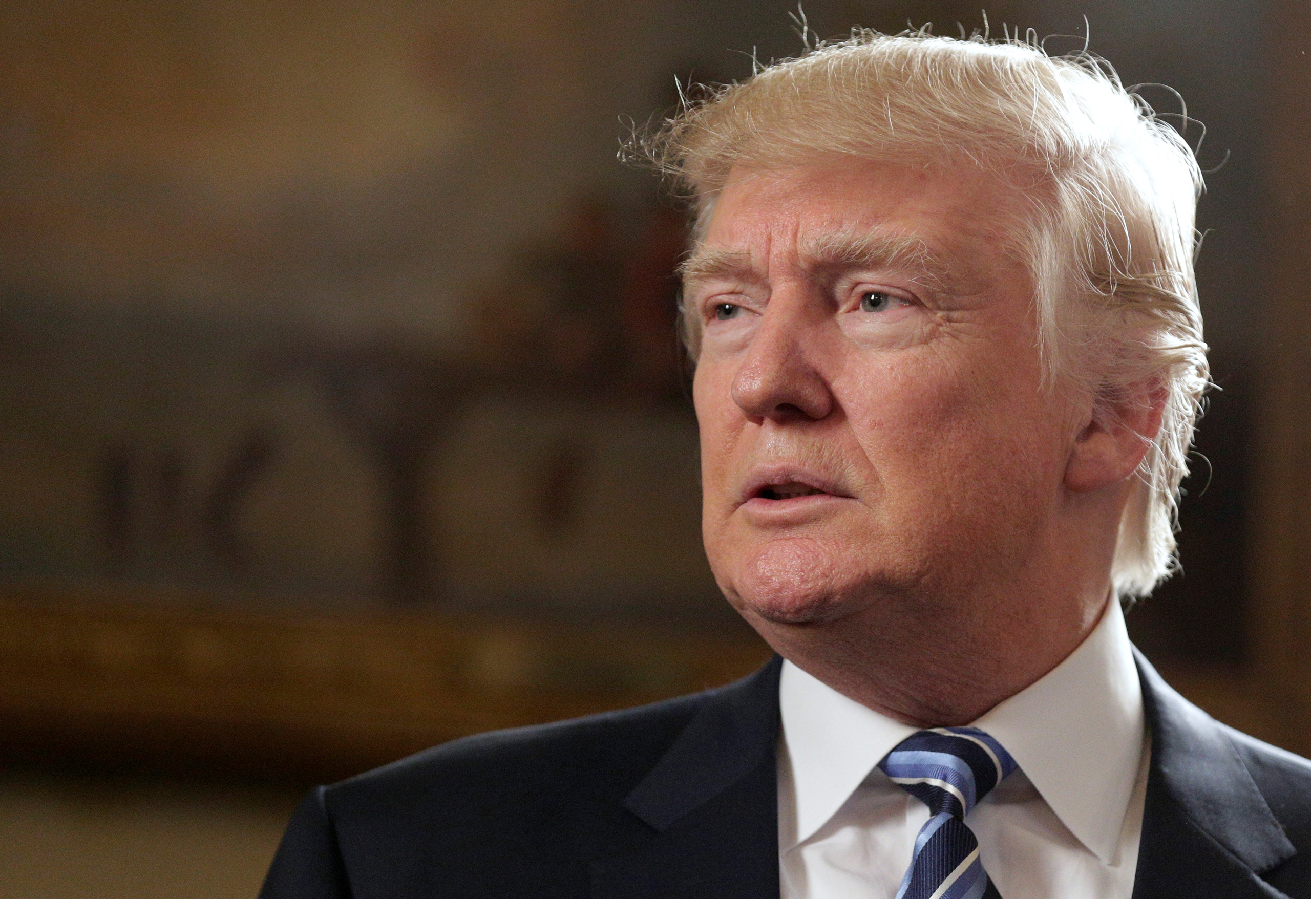 U.S. President Donald Trump speaks during the Inaugural Law Enforcement Officers and First Responders Reception in the Blue Room of the White House in Washington.